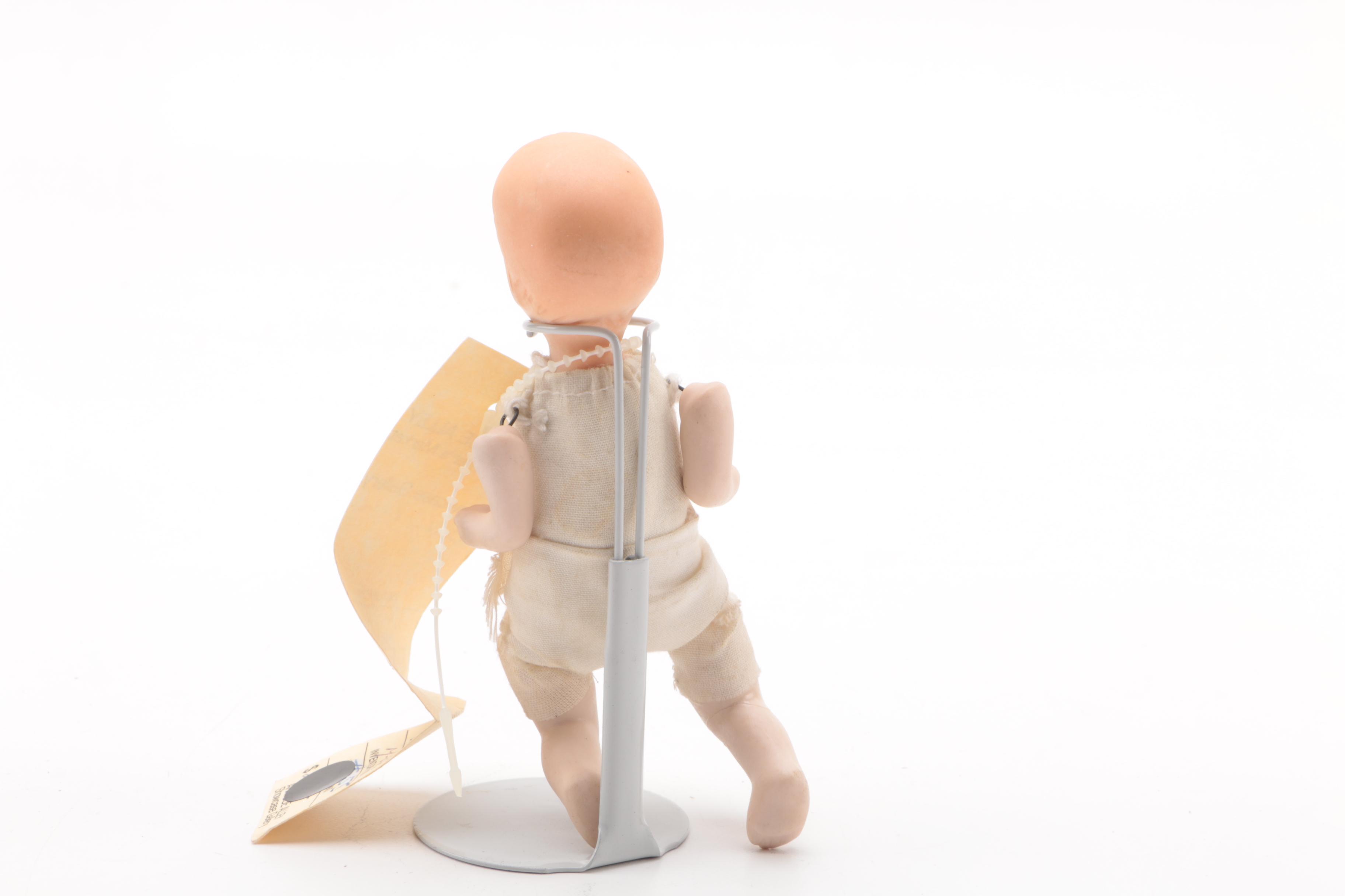 Vintage Plastic and Cloth Doll