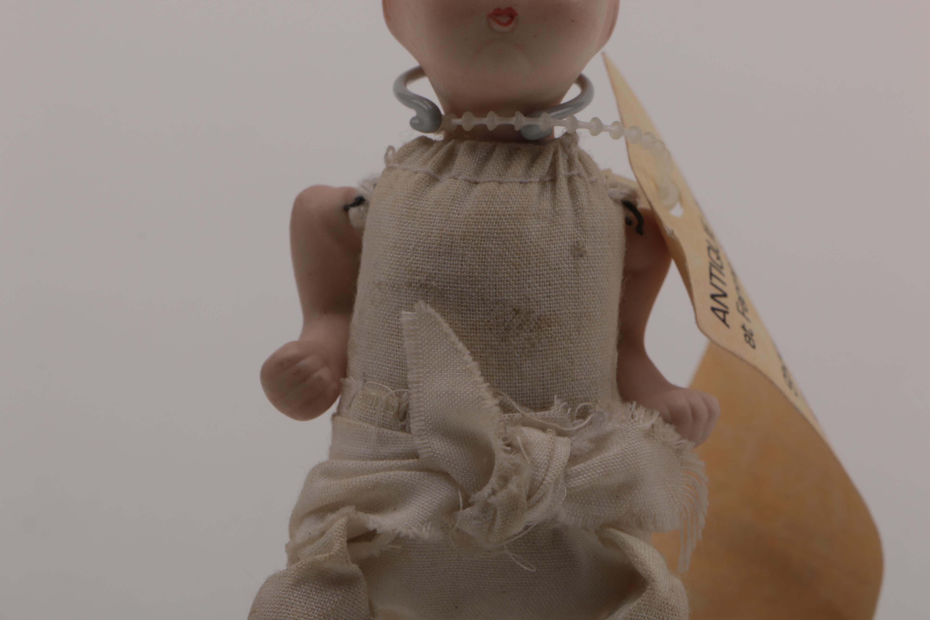 Vintage Plastic and Cloth Doll