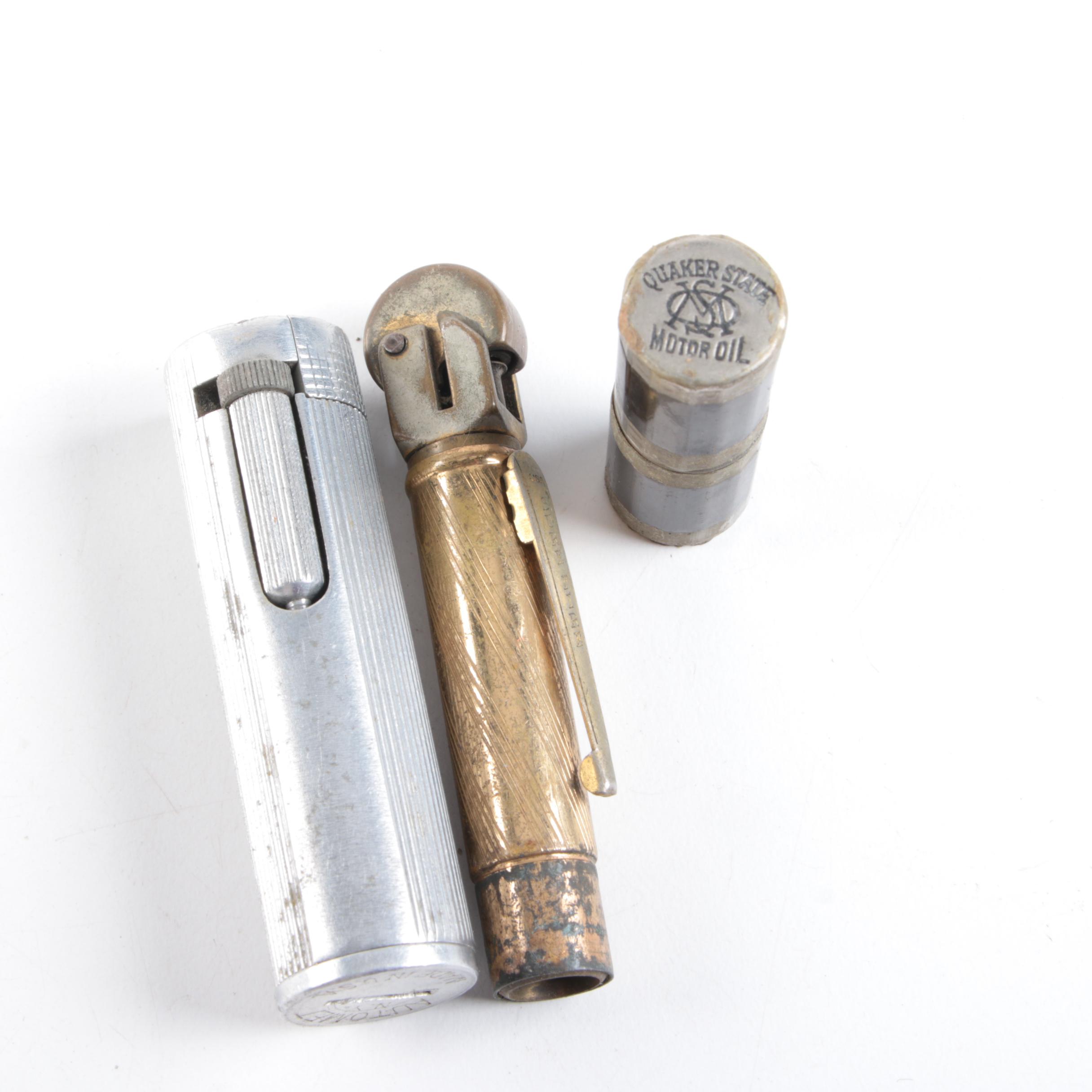 Vintage Trophy Ash Receiver, Newport Lights Boxing Glove, and Lighters