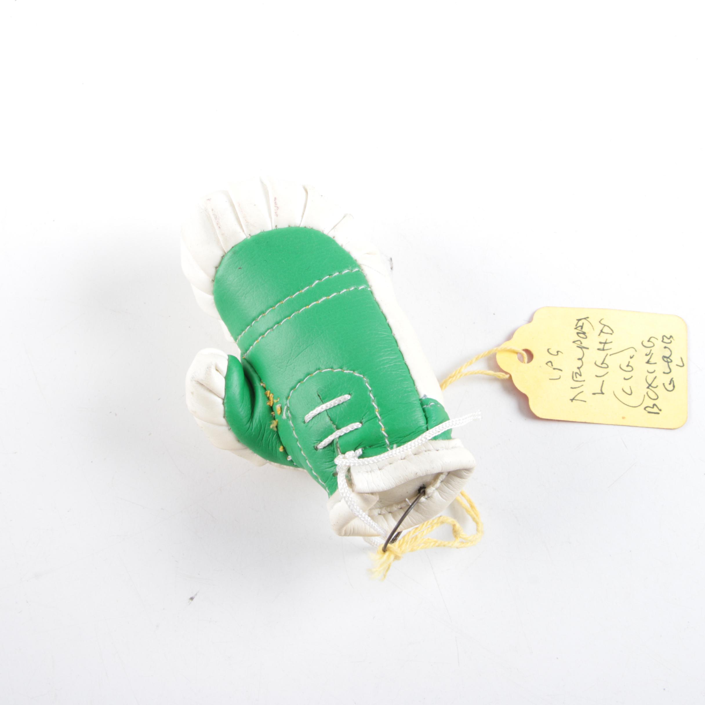 Vintage Trophy Ash Receiver, Newport Lights Boxing Glove, and Lighters