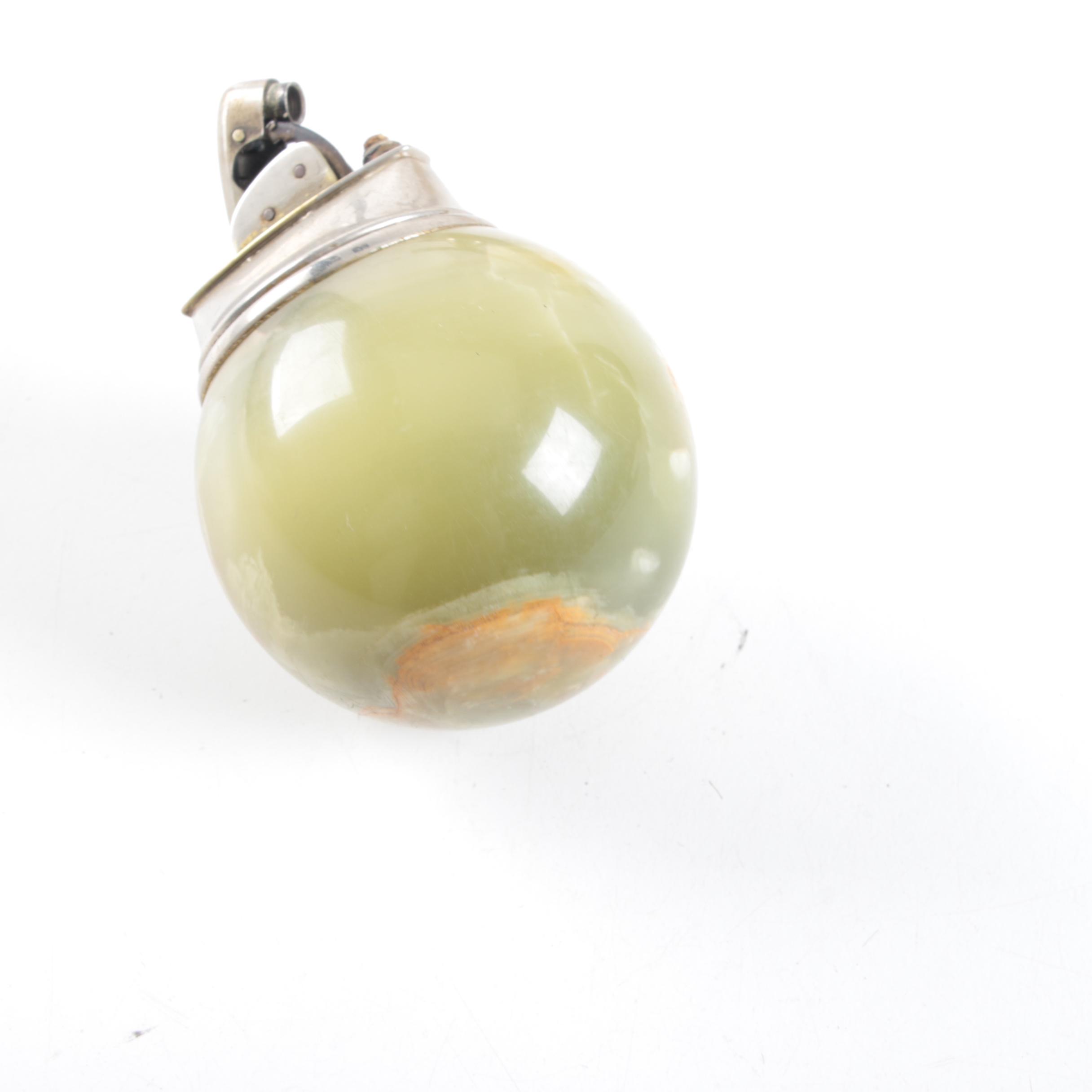 Vintage Trophy Ash Receiver, Newport Lights Boxing Glove, and Lighters