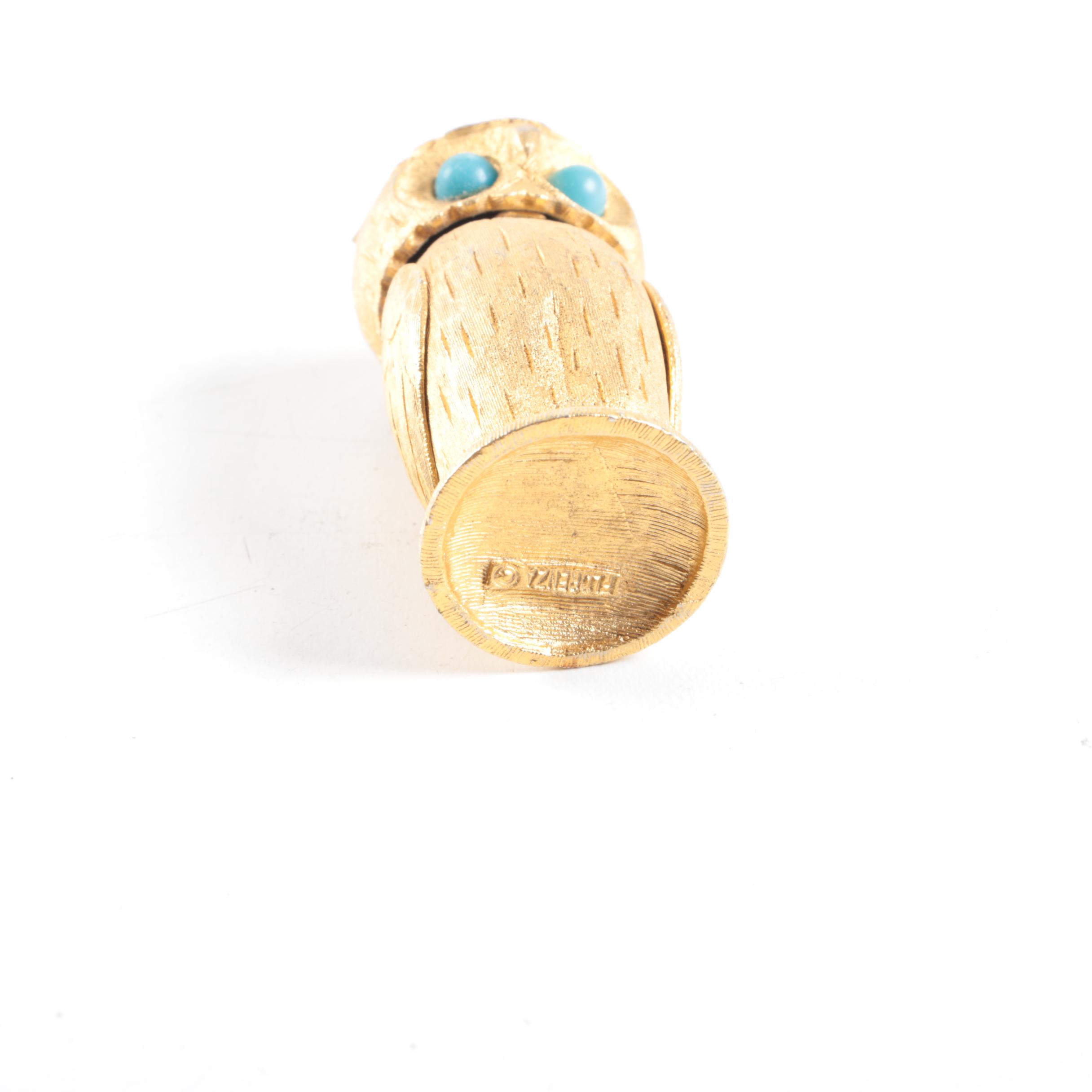 Vintage Trophy Ash Receiver, Newport Lights Boxing Glove, and Lighters