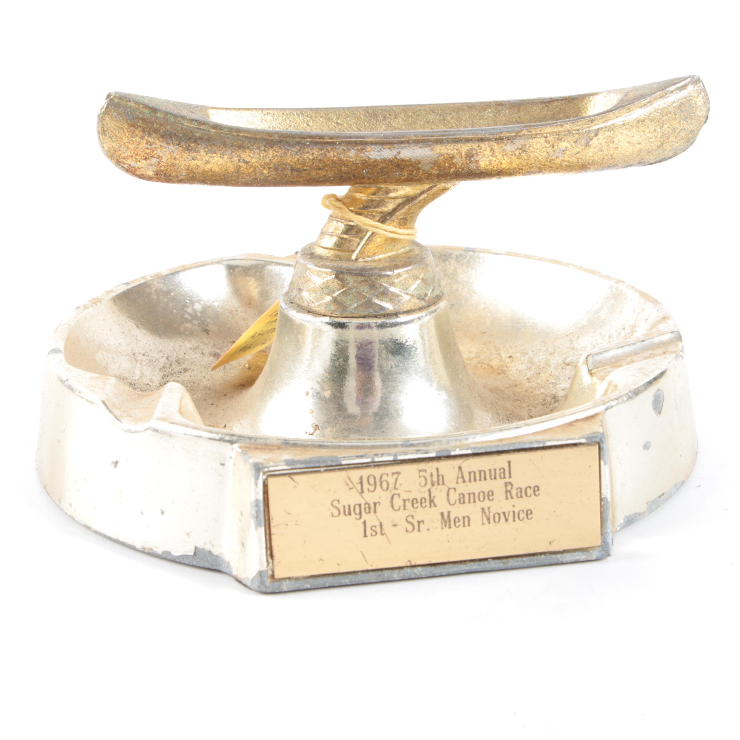 Vintage Trophy Ash Receiver, Newport Lights Boxing Glove, and Lighters