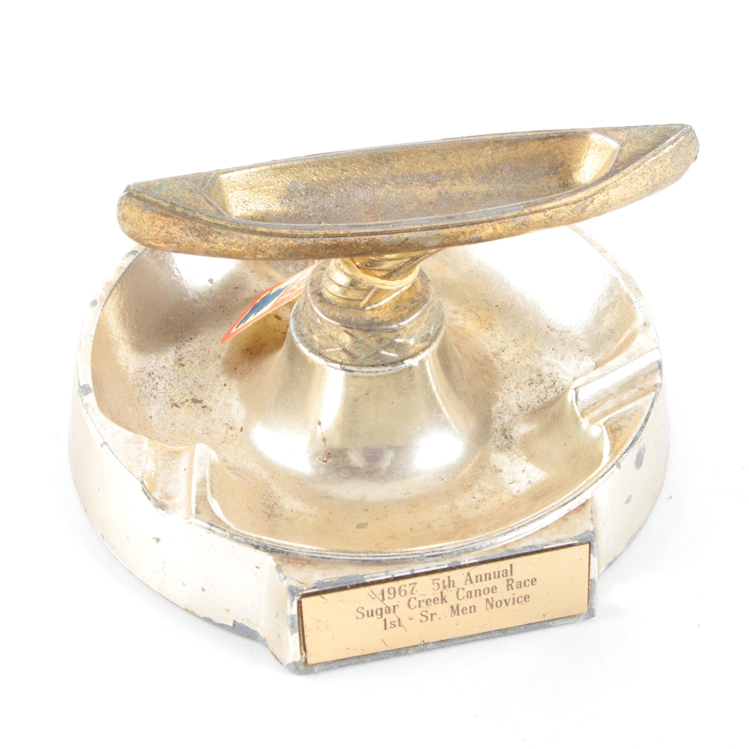 Vintage Trophy Ash Receiver, Newport Lights Boxing Glove, and Lighters