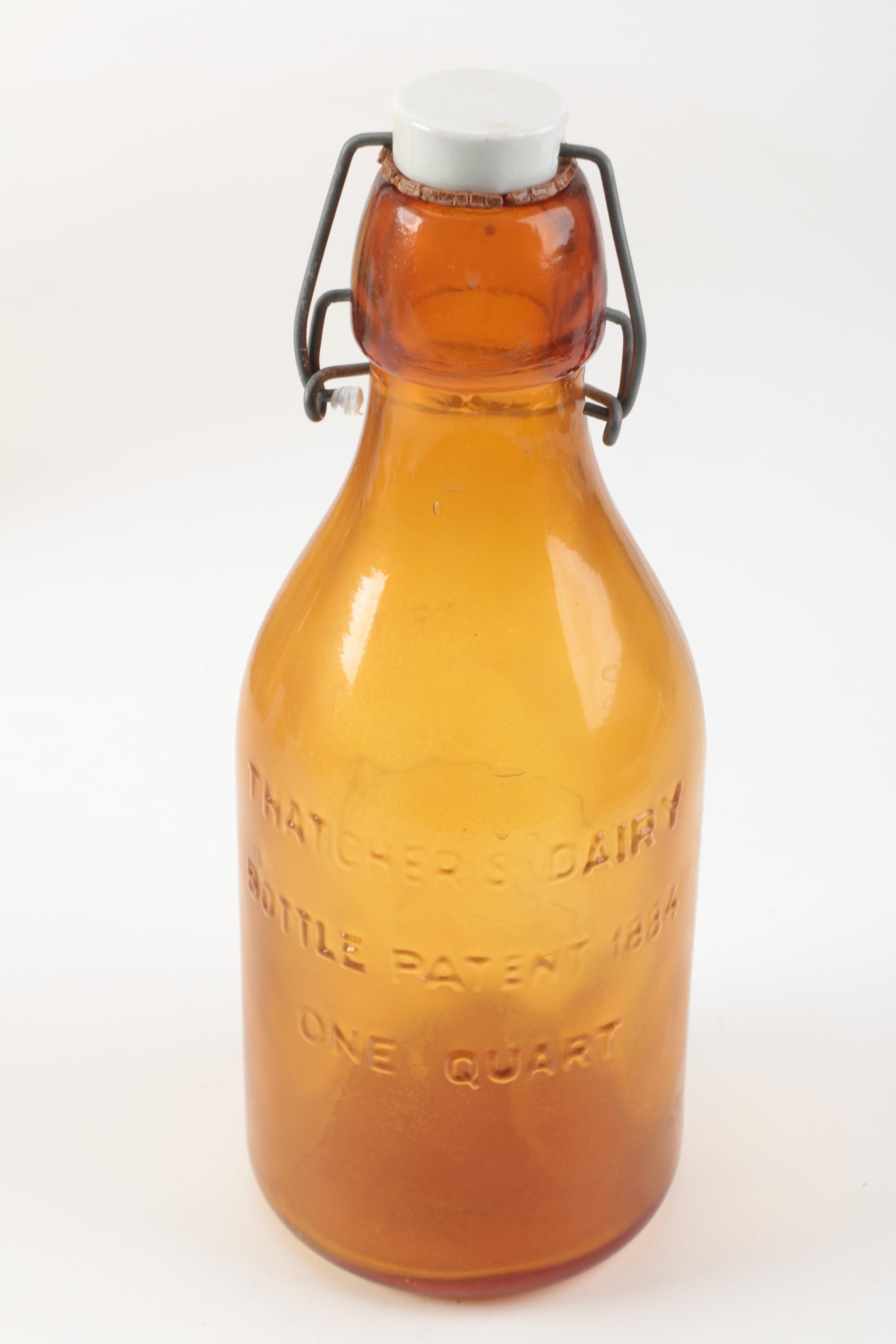 Amber-Colored Glassware Including Blenko Ambernia Double Carafe