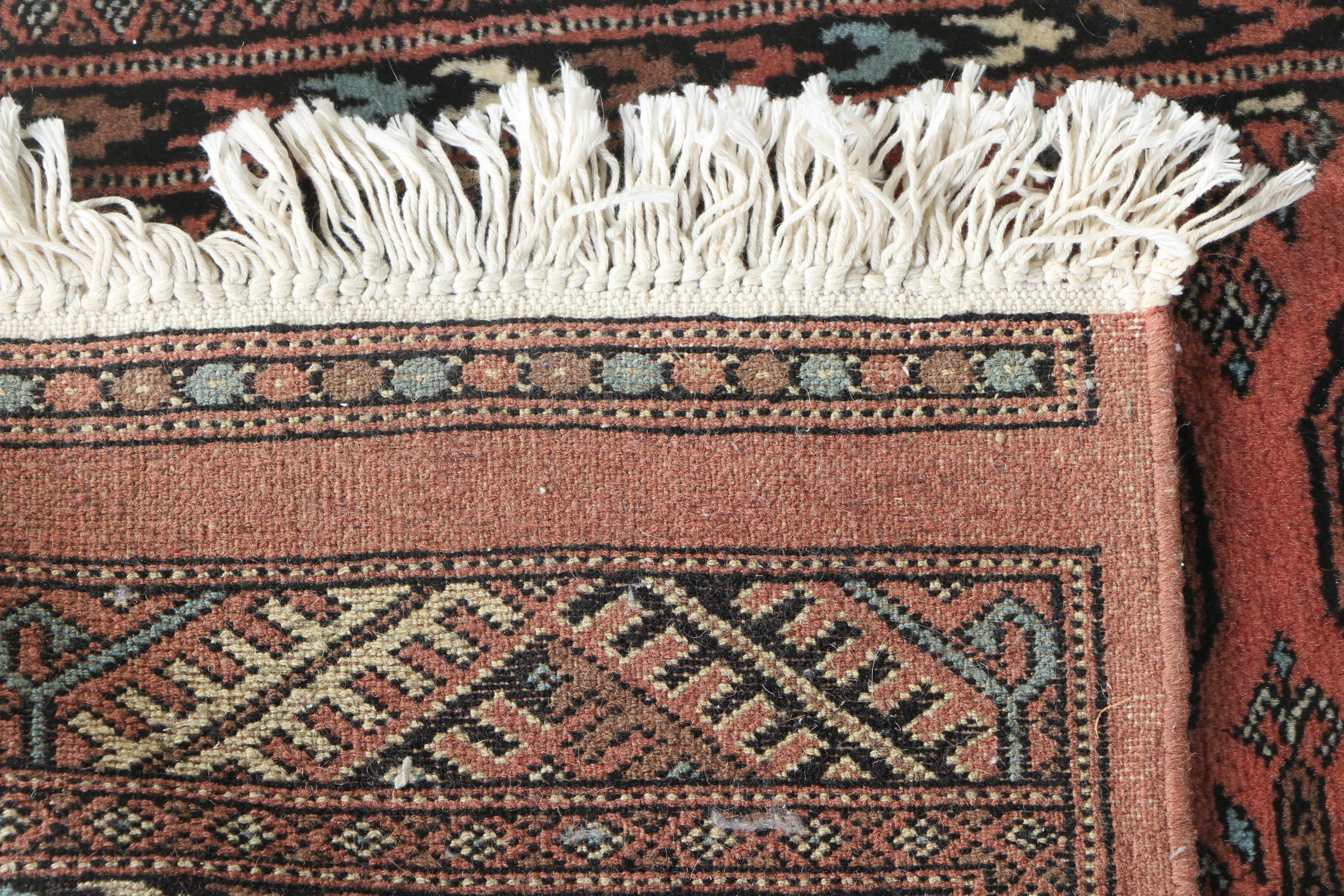 Pair of Hand-Knotted Tekke Bokhara Wool Accent Rugs