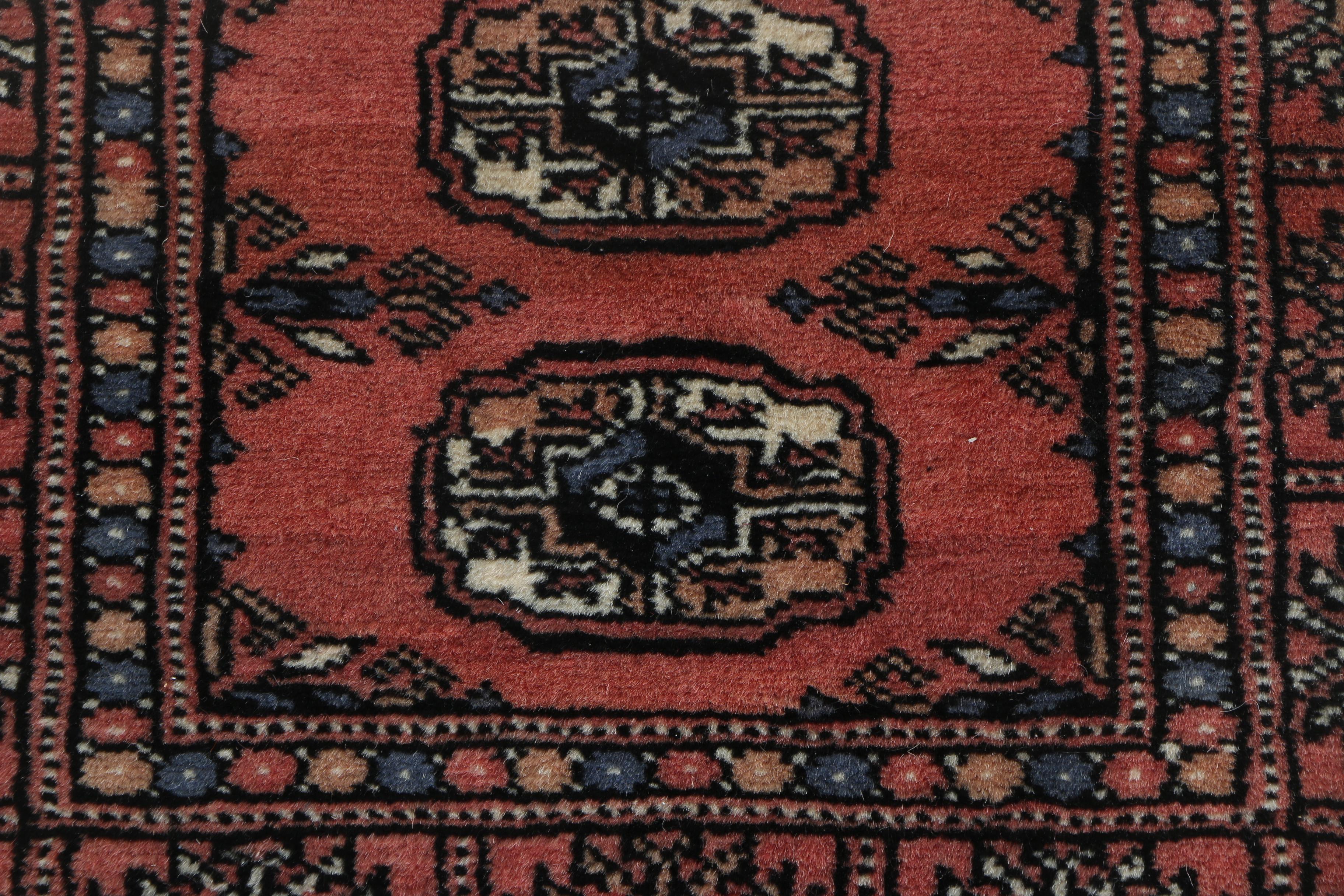 Pair of Hand-Knotted Tekke Bokhara Wool Accent Rugs