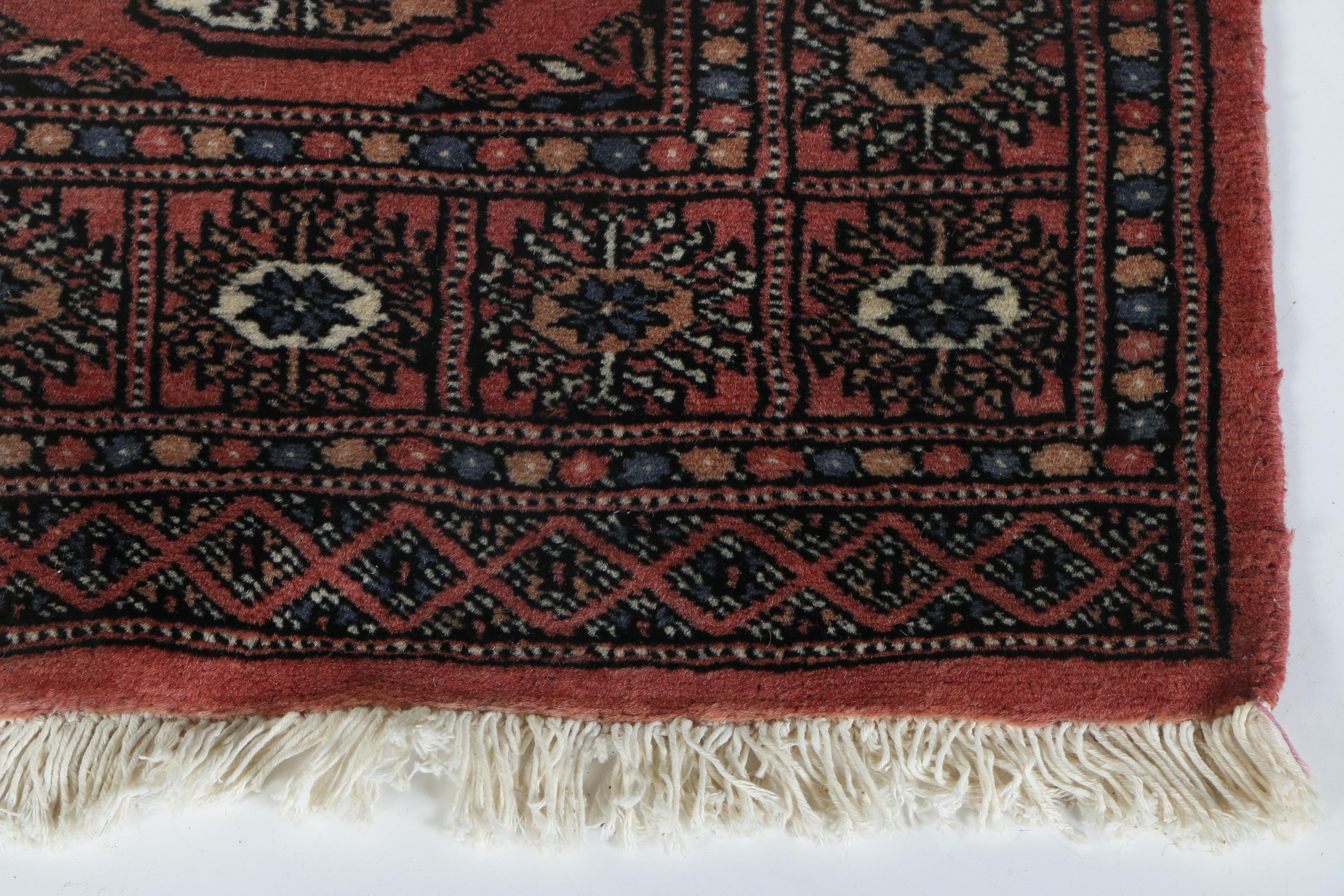 Pair of Hand-Knotted Tekke Bokhara Wool Accent Rugs