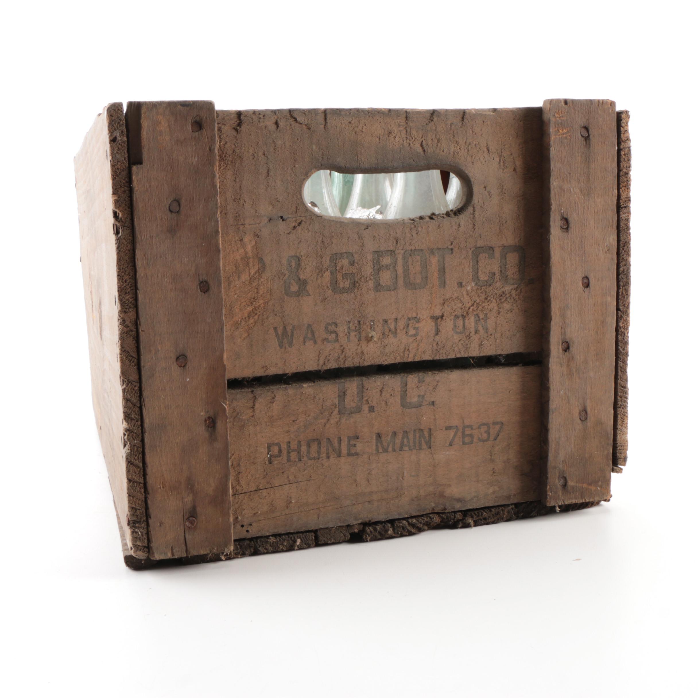Vintage Glass Bottles in Wooden Crate