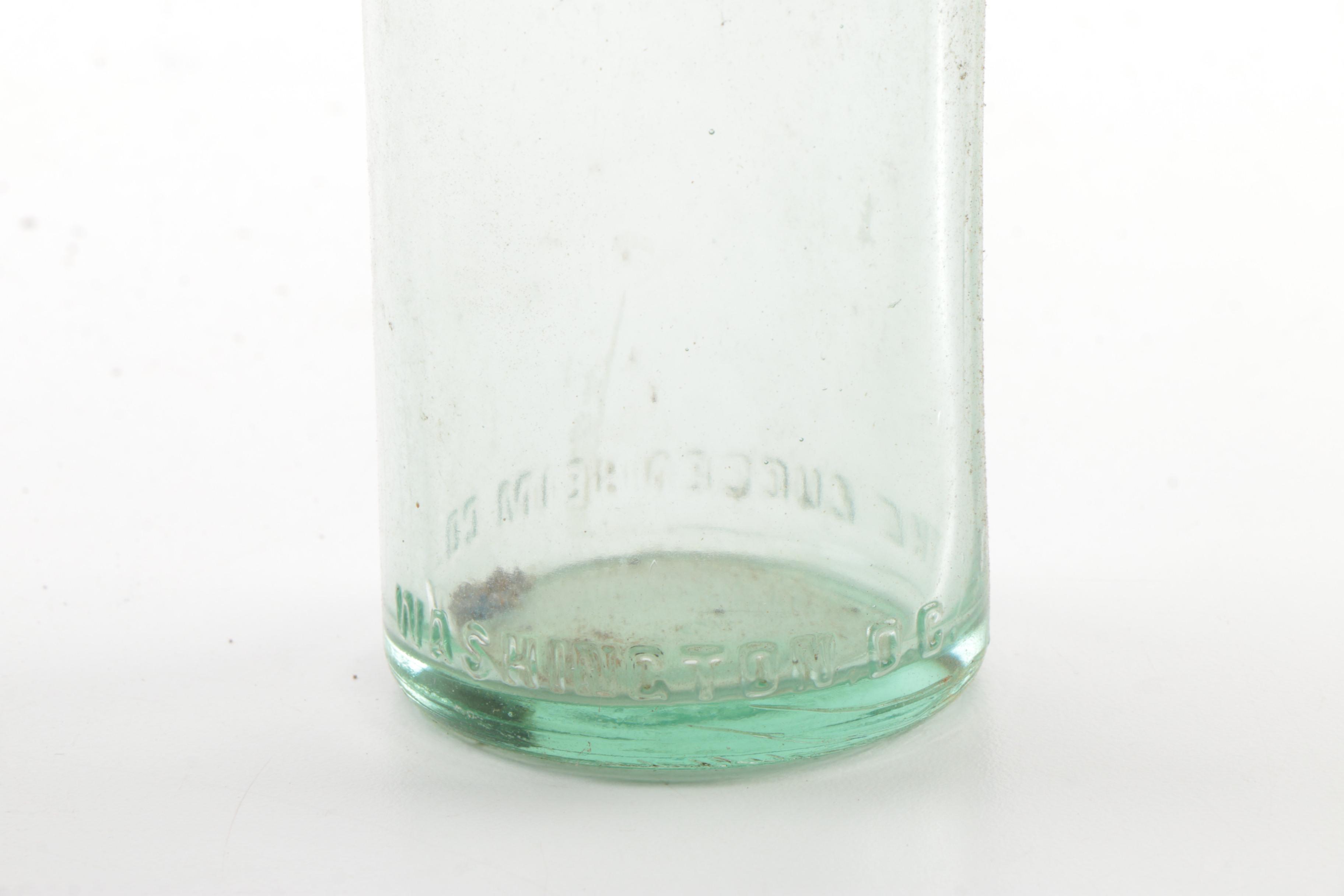 Vintage Glass Bottles in Wooden Crate