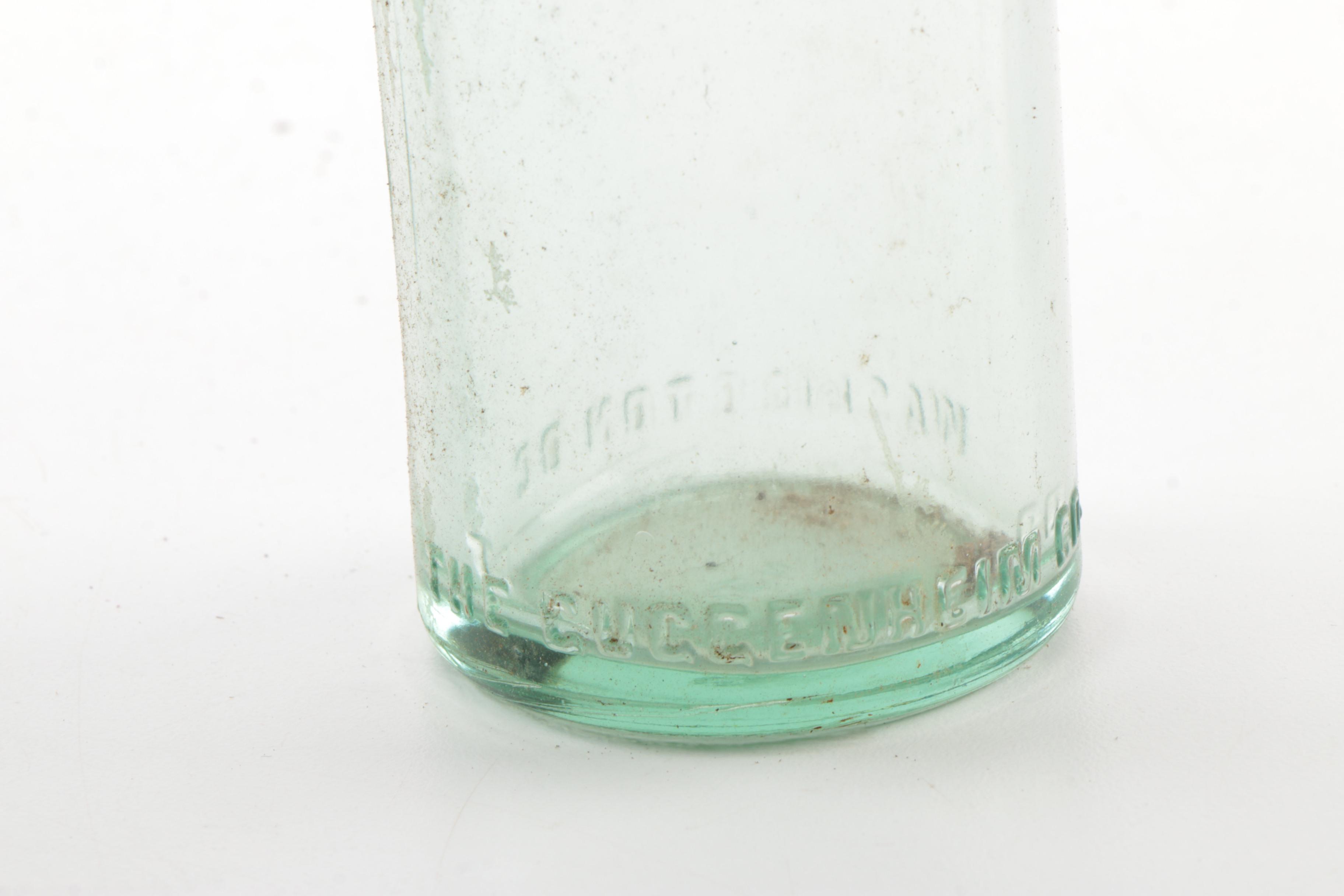 Vintage Glass Bottles in Wooden Crate