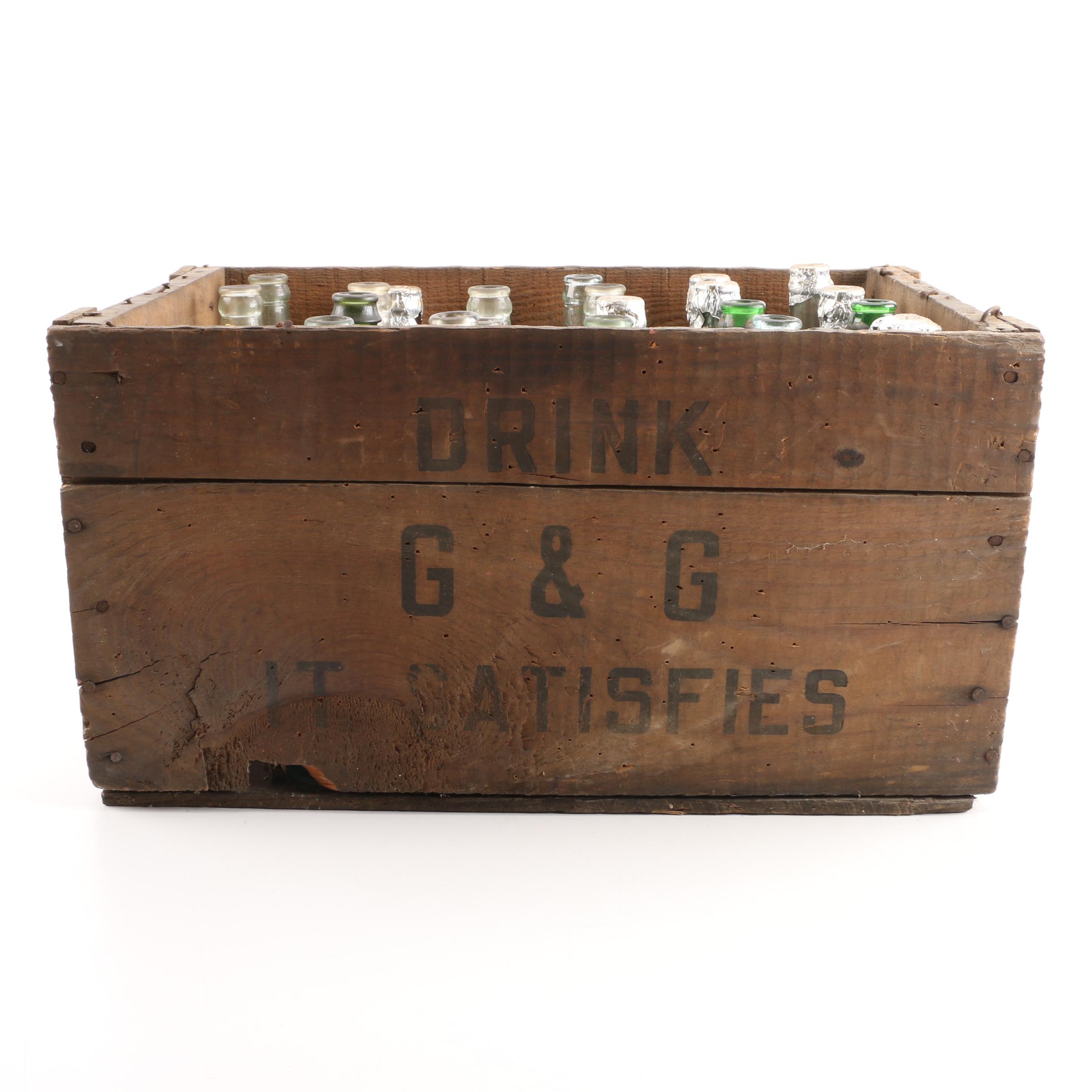 Vintage Glass Bottles in Wooden Crate