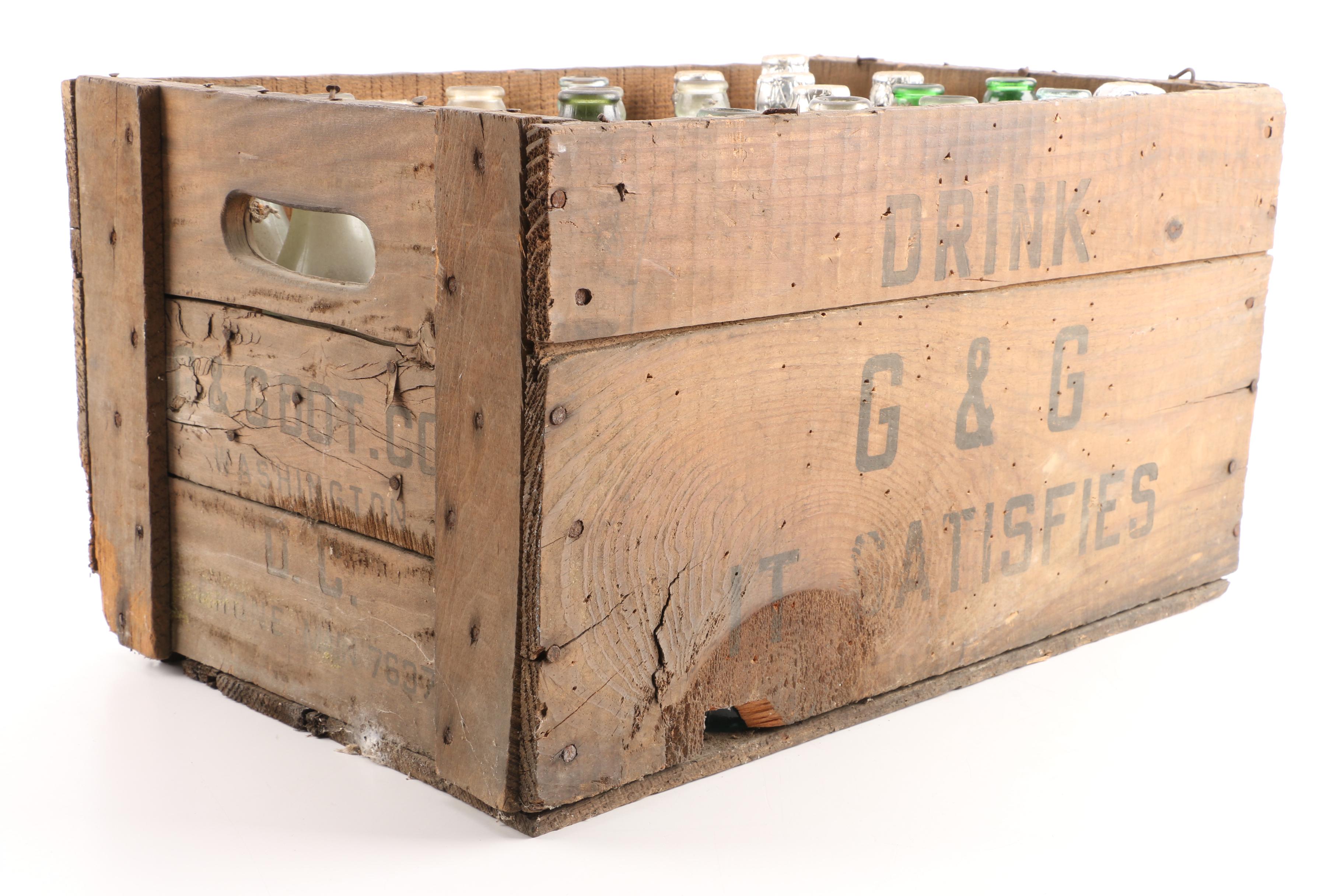 Vintage Glass Bottles in Wooden Crate