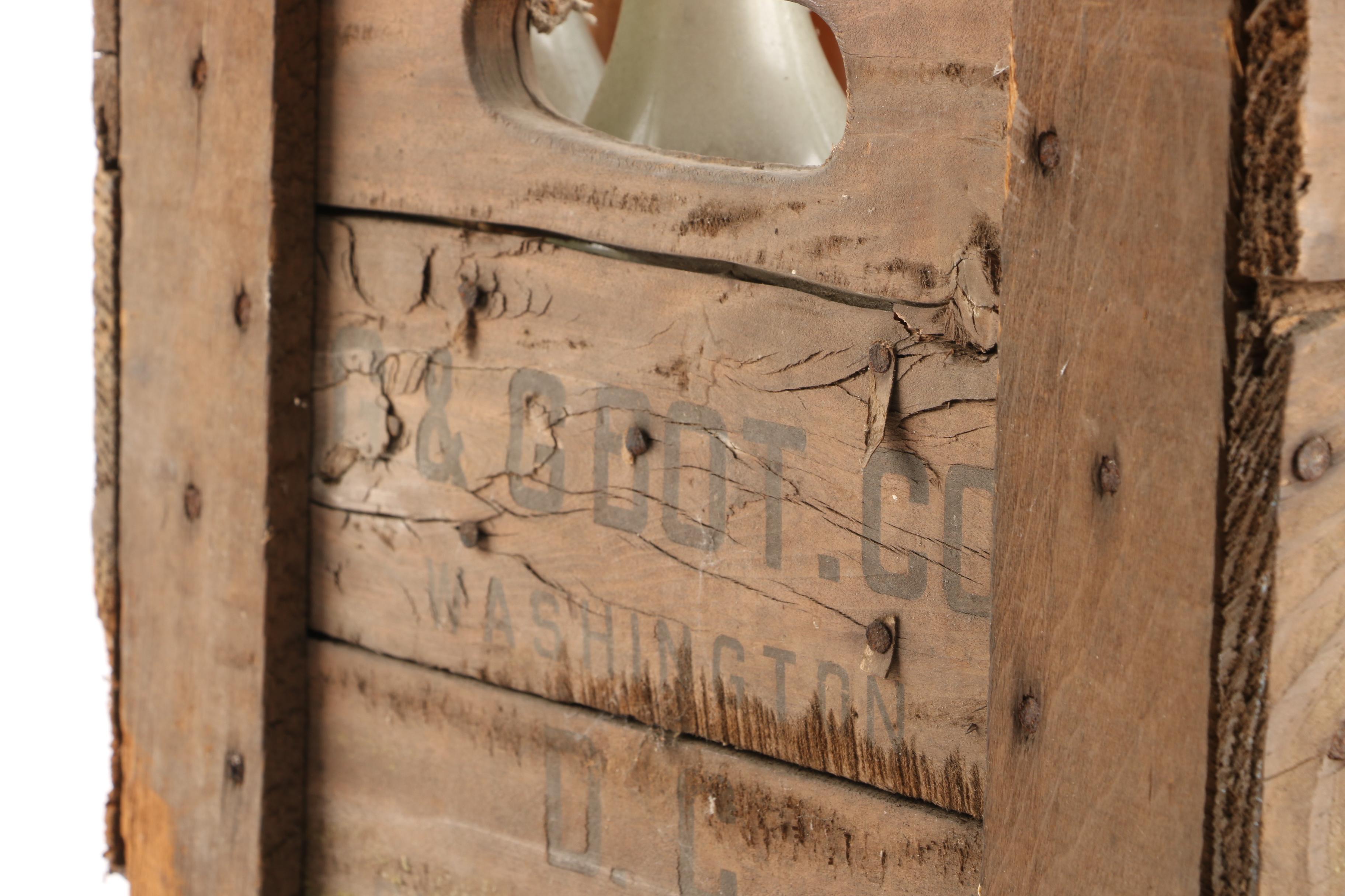 Vintage Glass Bottles in Wooden Crate