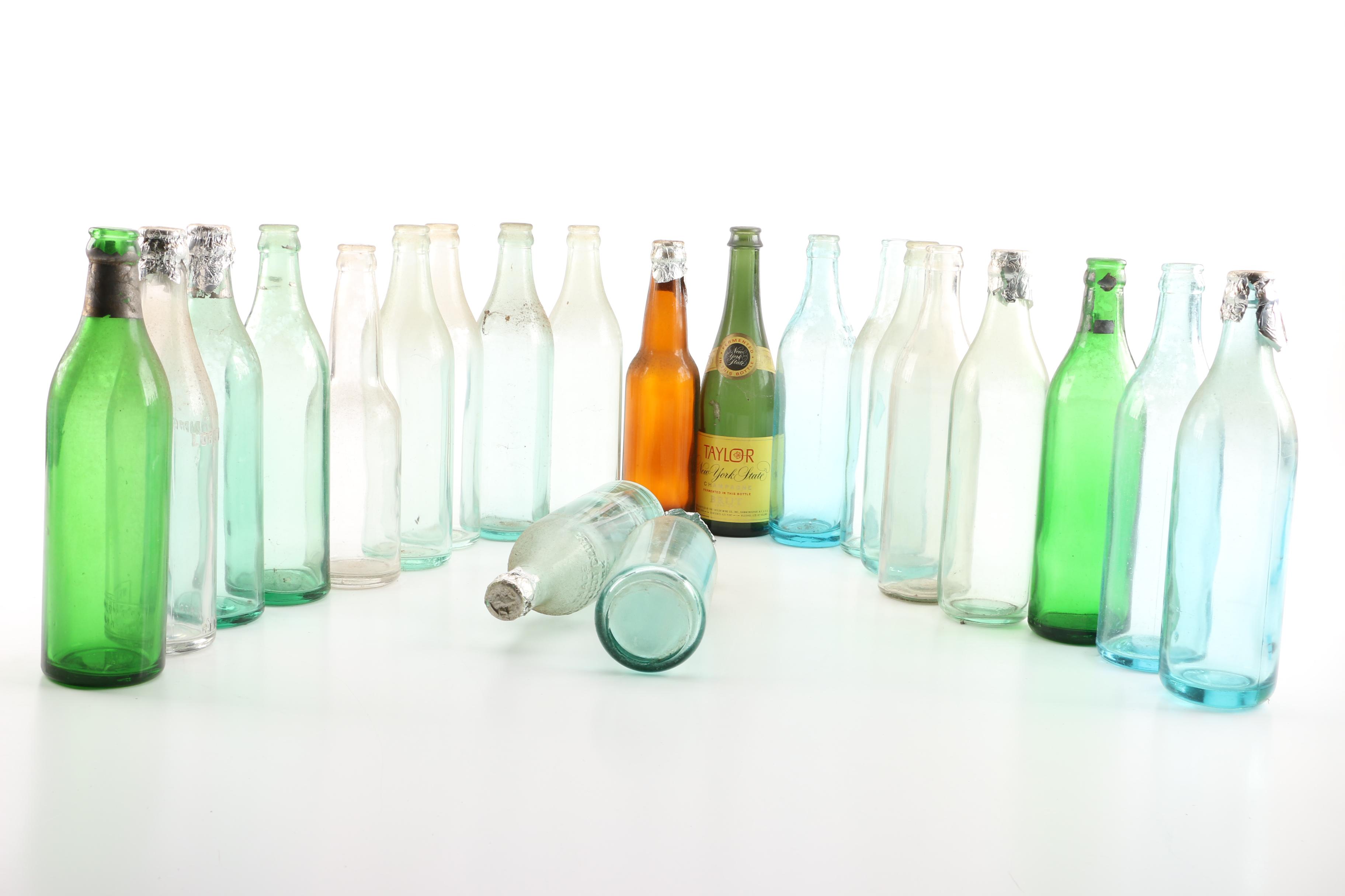 Vintage Glass Bottles in Wooden Crate