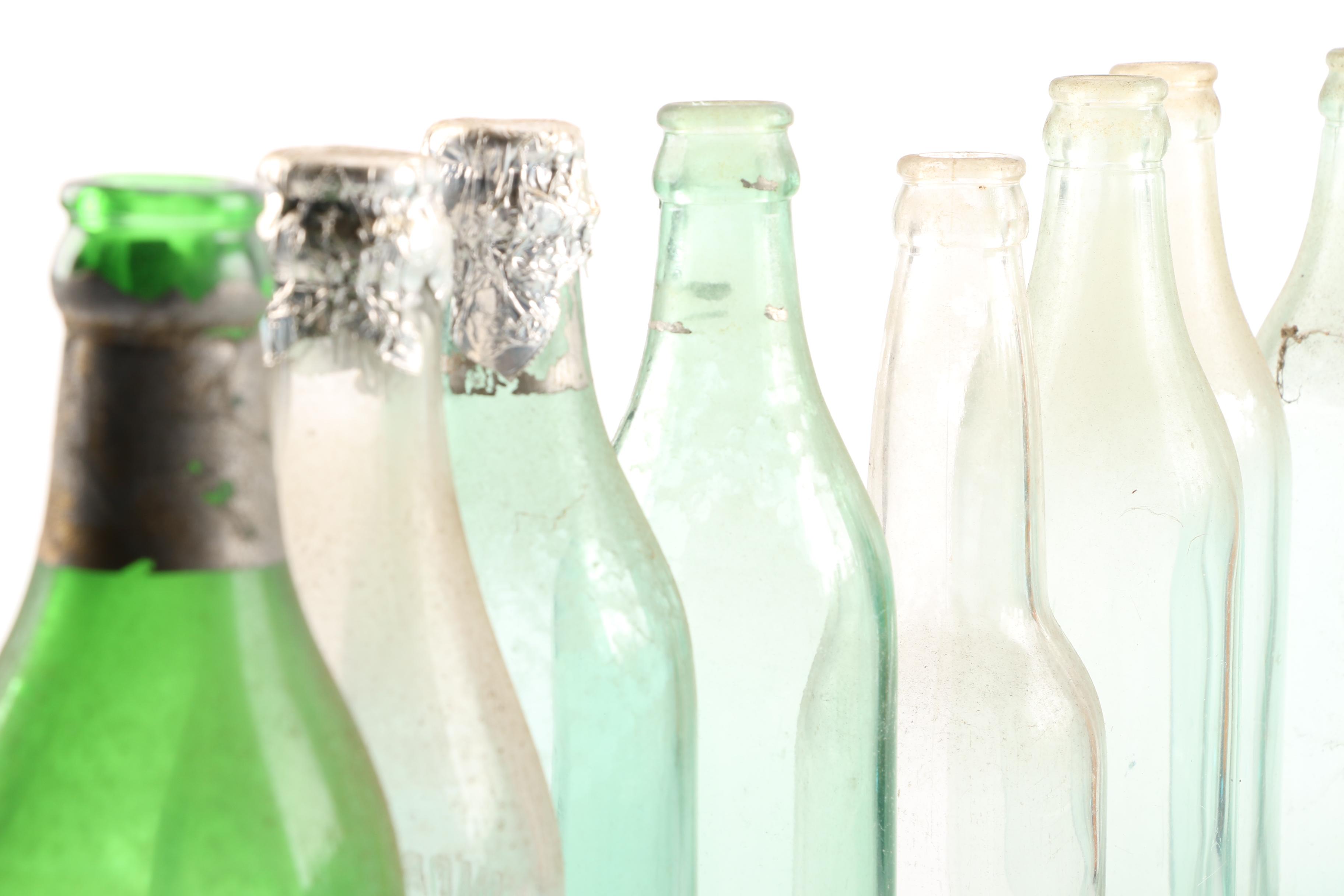 Vintage Glass Bottles in Wooden Crate