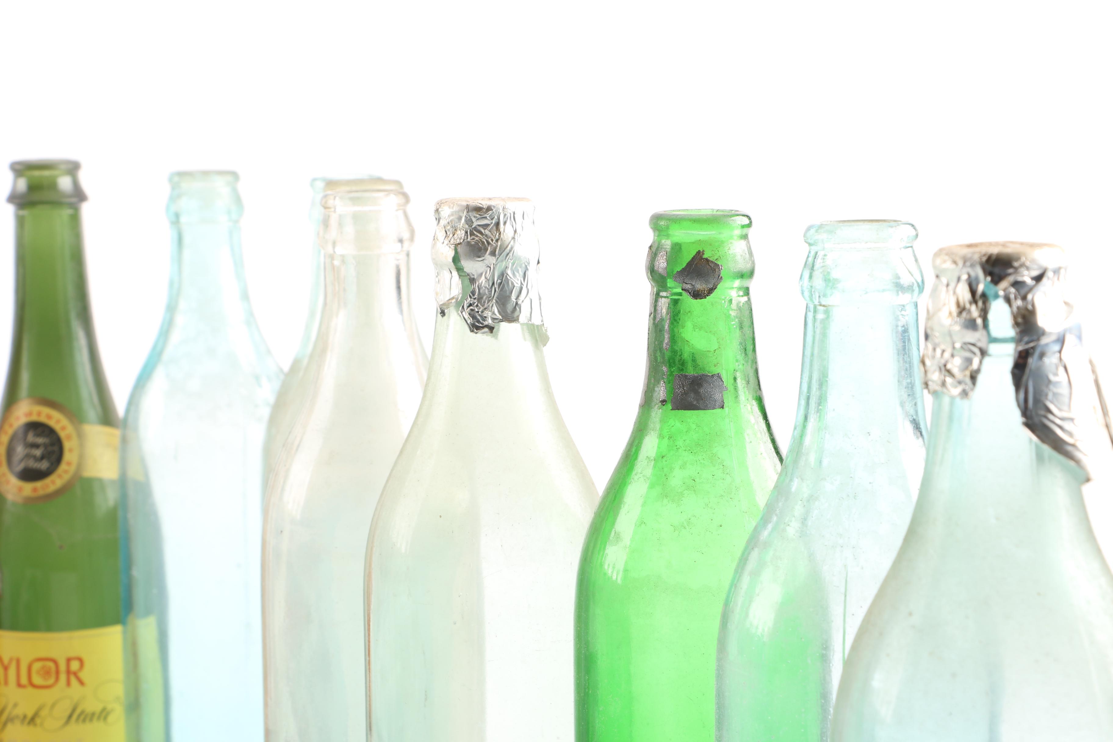 Vintage Glass Bottles in Wooden Crate