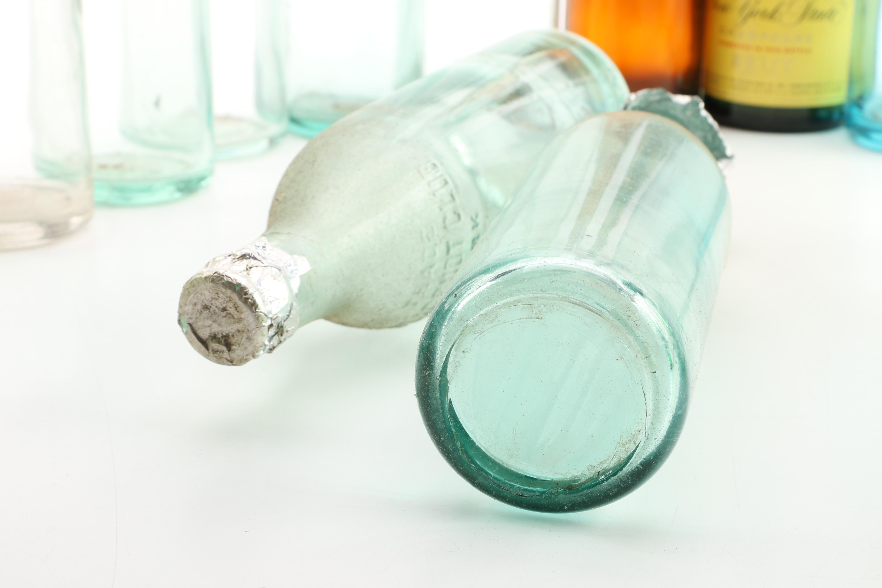 Vintage Glass Bottles in Wooden Crate