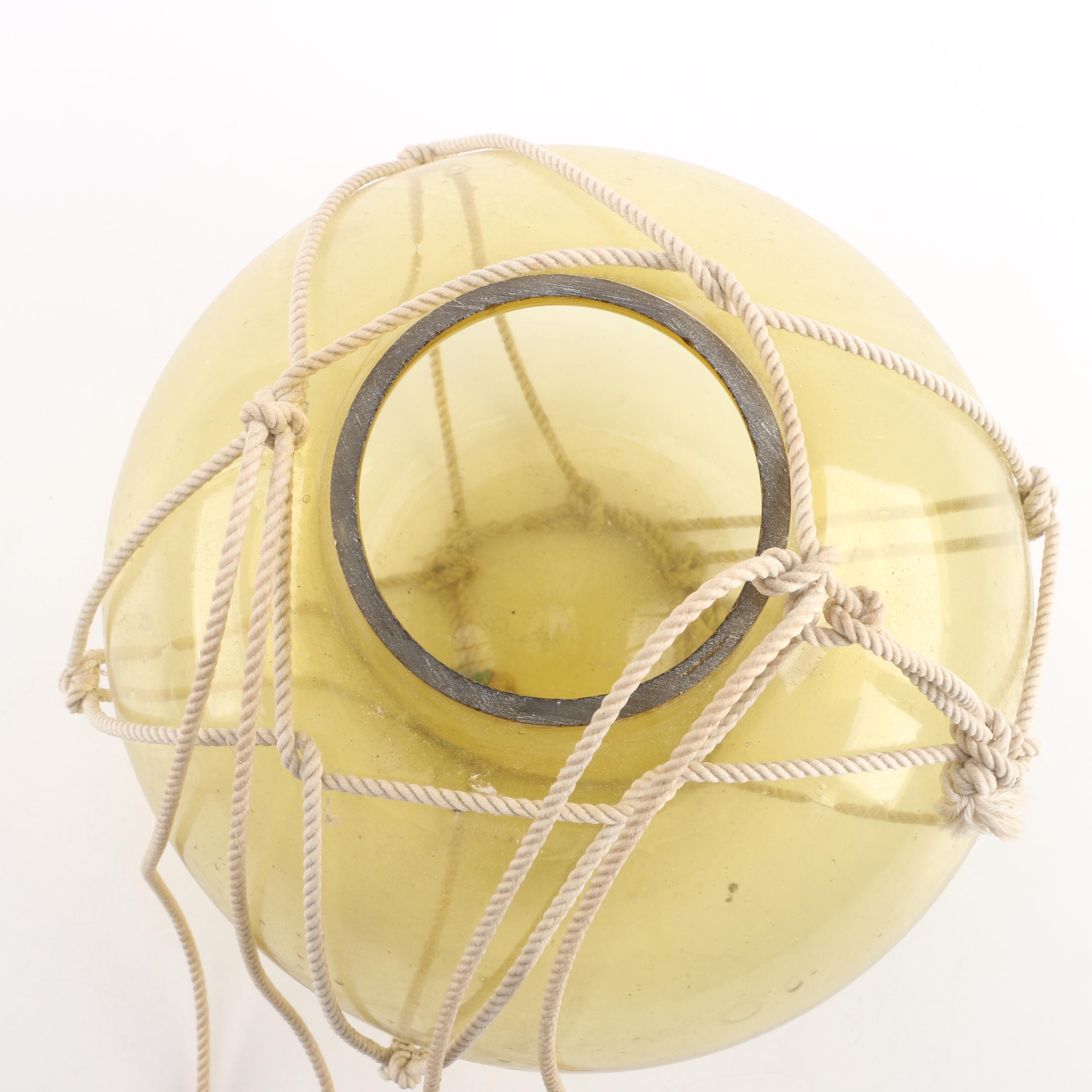 Decorative Hanging Amber-Hued Glass Sphere