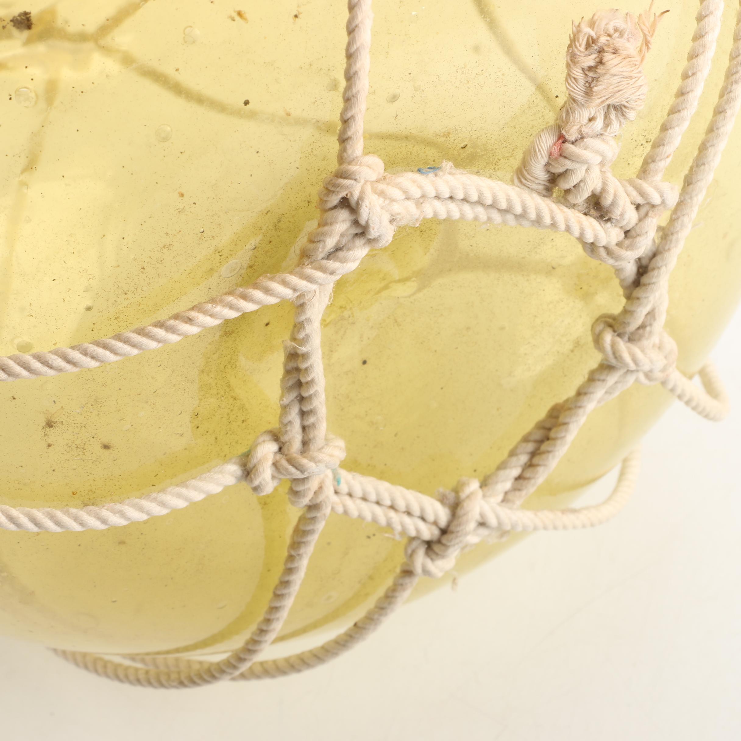 Decorative Hanging Amber-Hued Glass Sphere