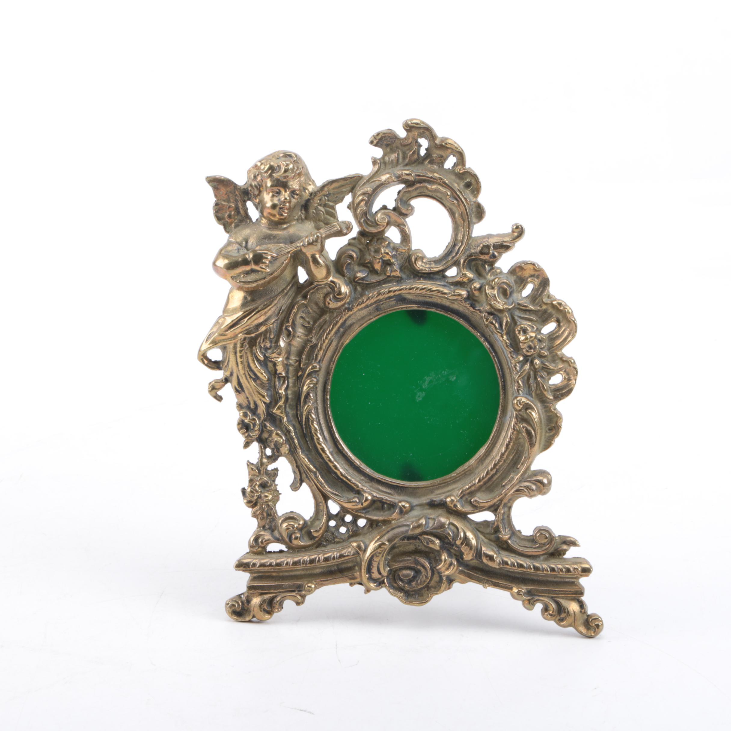 Ornate Freestanding Metal Picture Frame with Cherub Accent