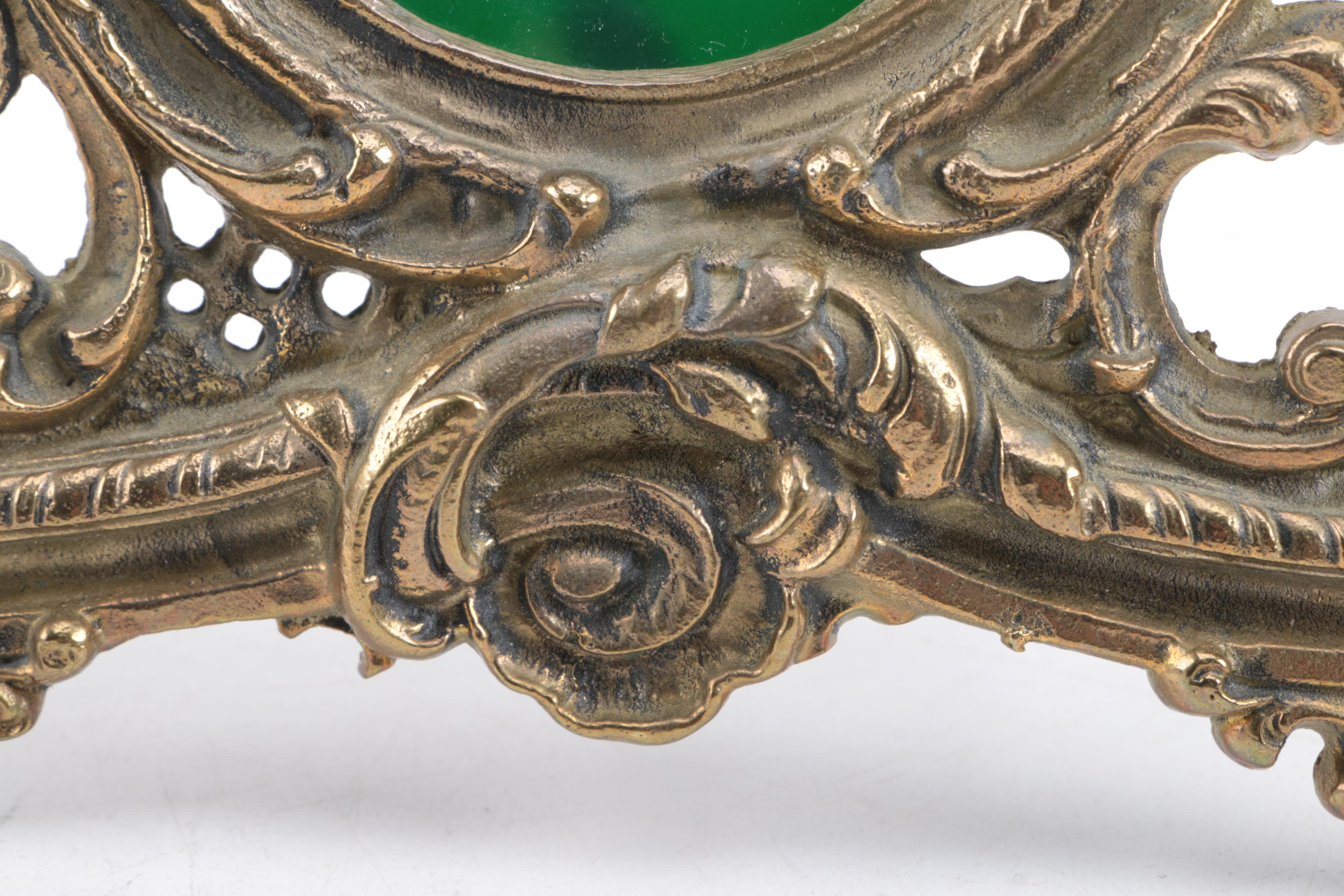 Ornate Freestanding Metal Picture Frame with Cherub Accent