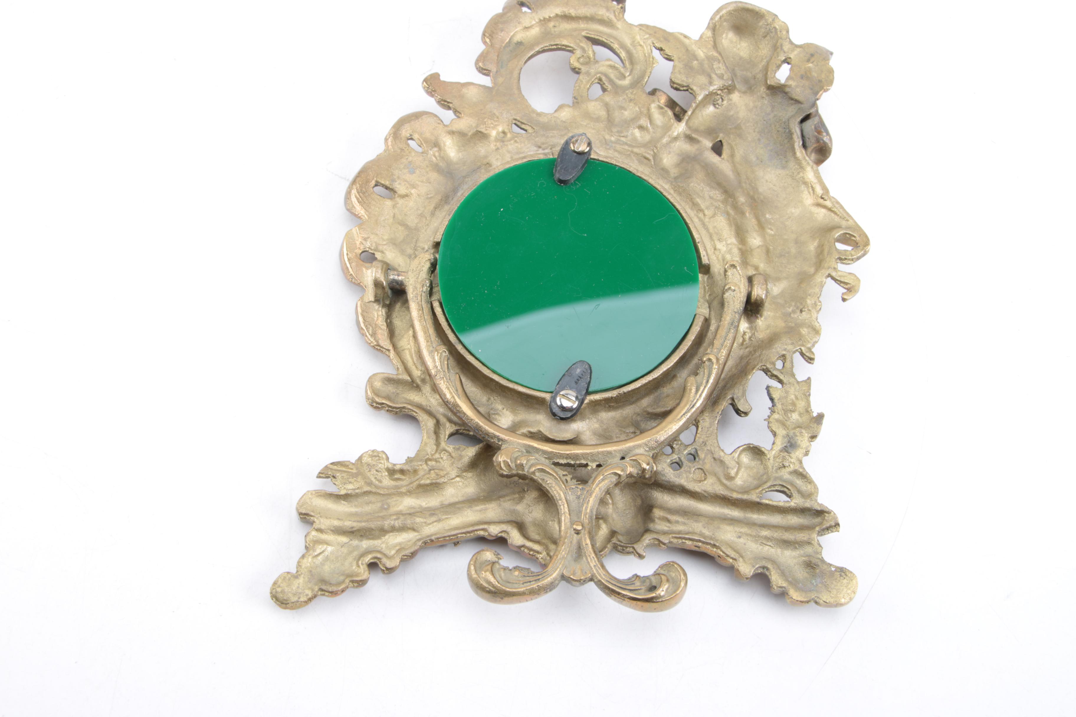 Ornate Freestanding Metal Picture Frame with Cherub Accent