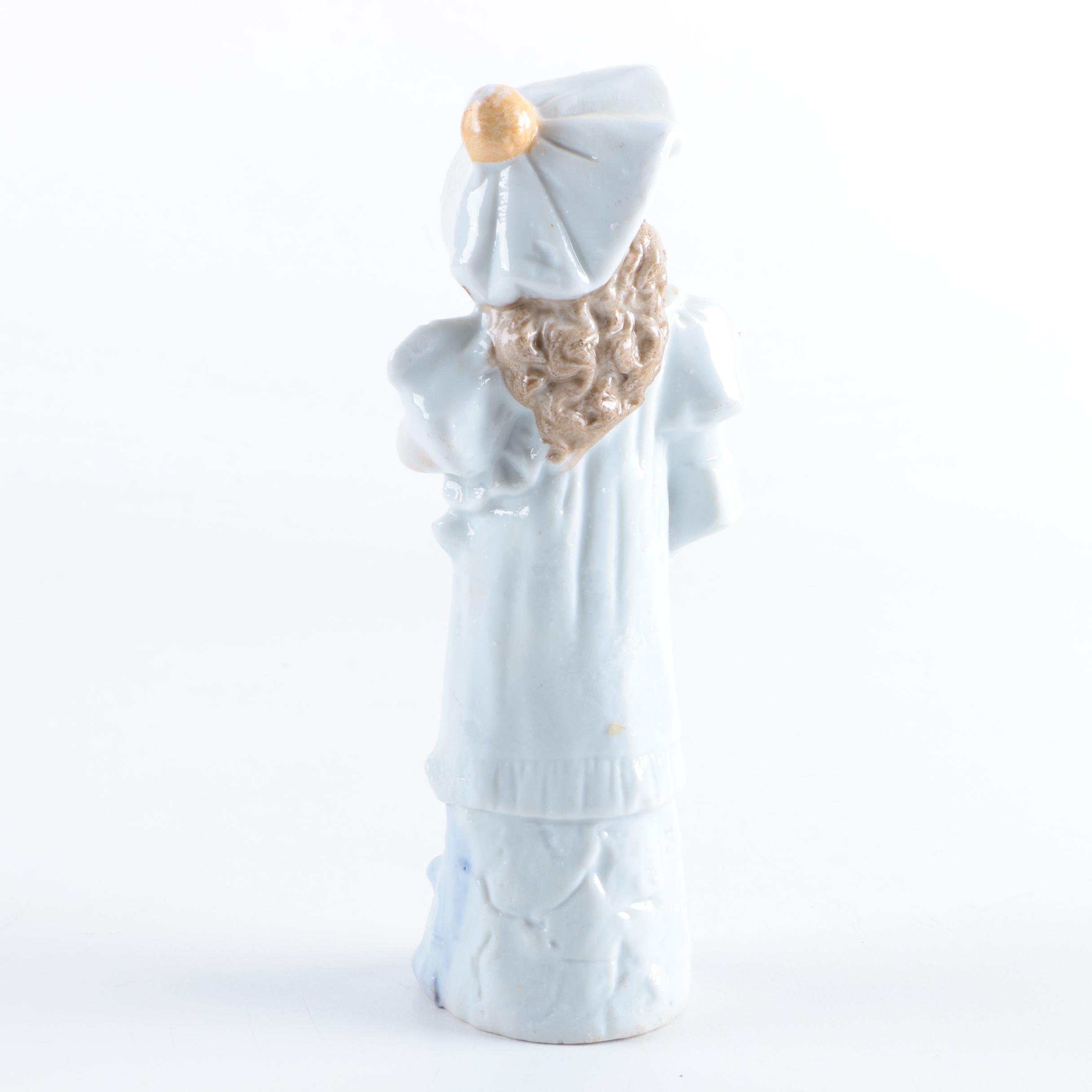 Gebrüder Heubach Porcelain Shepherd and Porcelain Girl Figurine