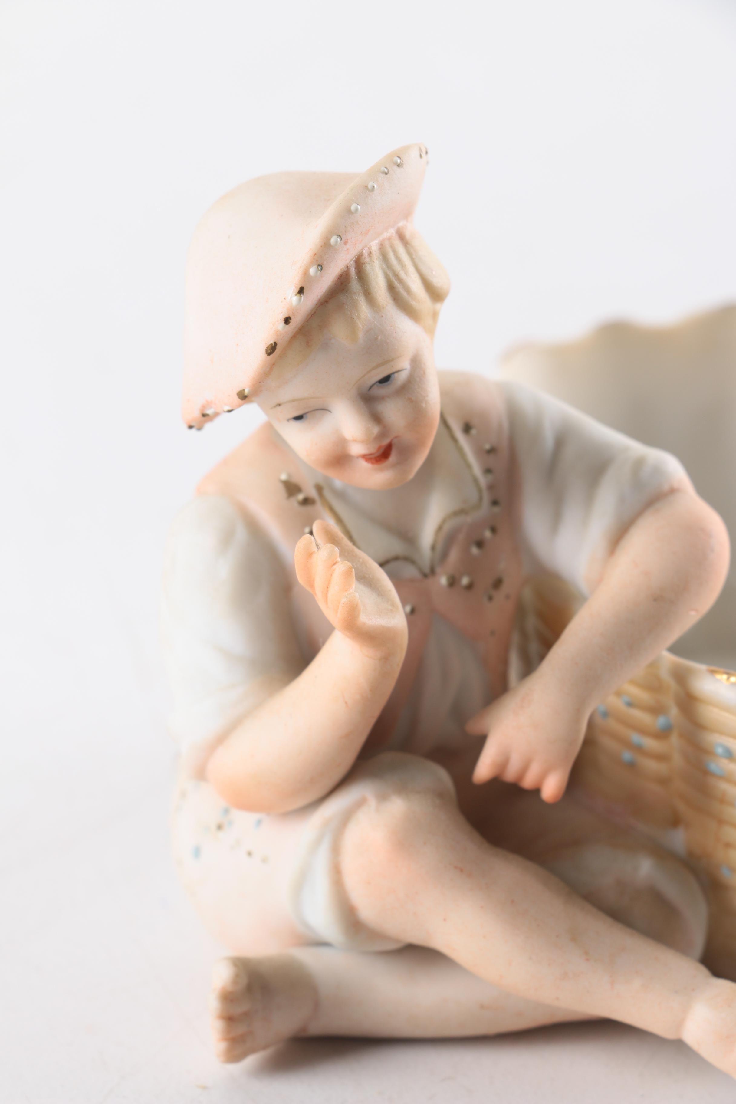 Arnart Boy with Basket Bisque Porcelain Match Holder Figurine