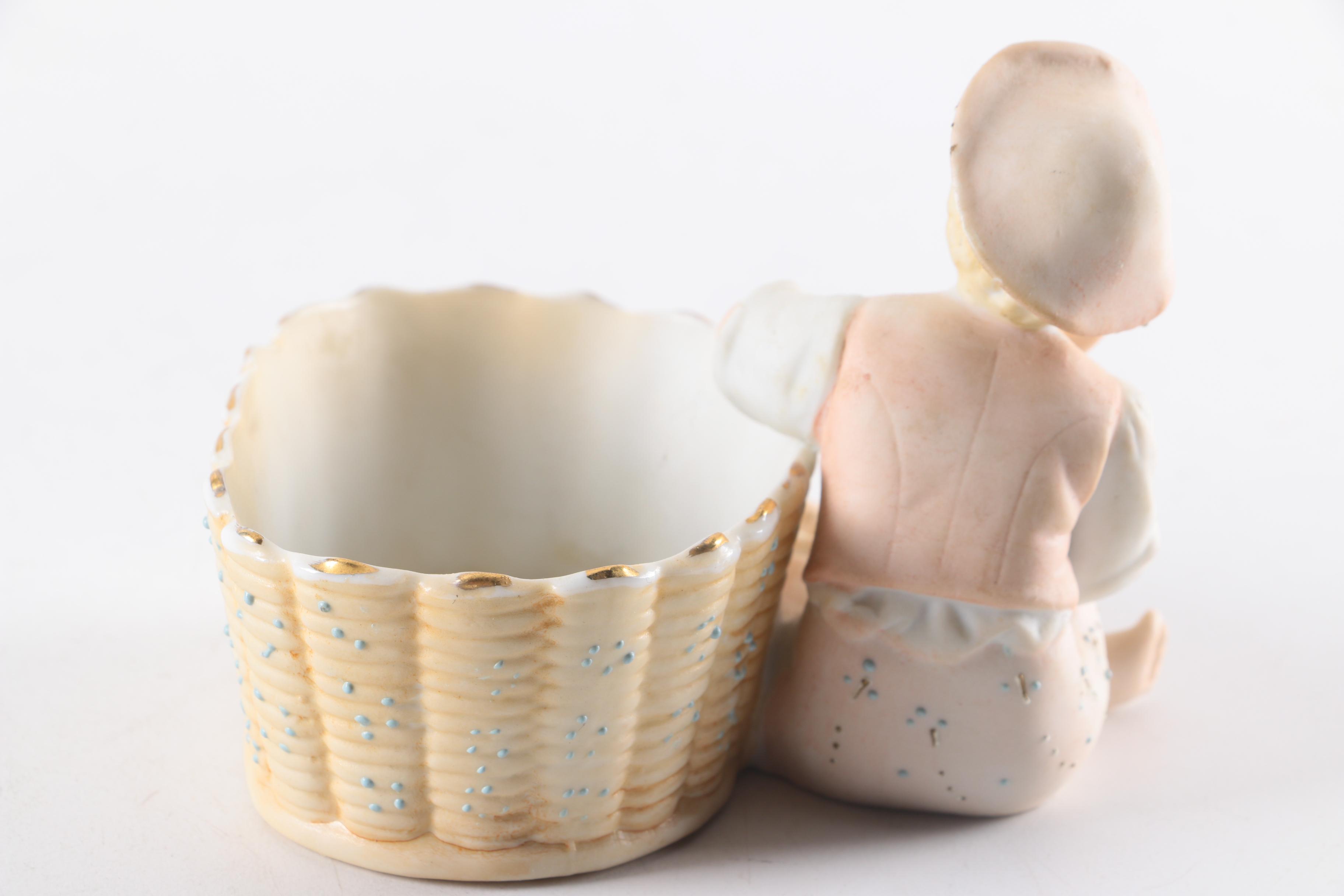 Arnart Boy with Basket Bisque Porcelain Match Holder Figurine