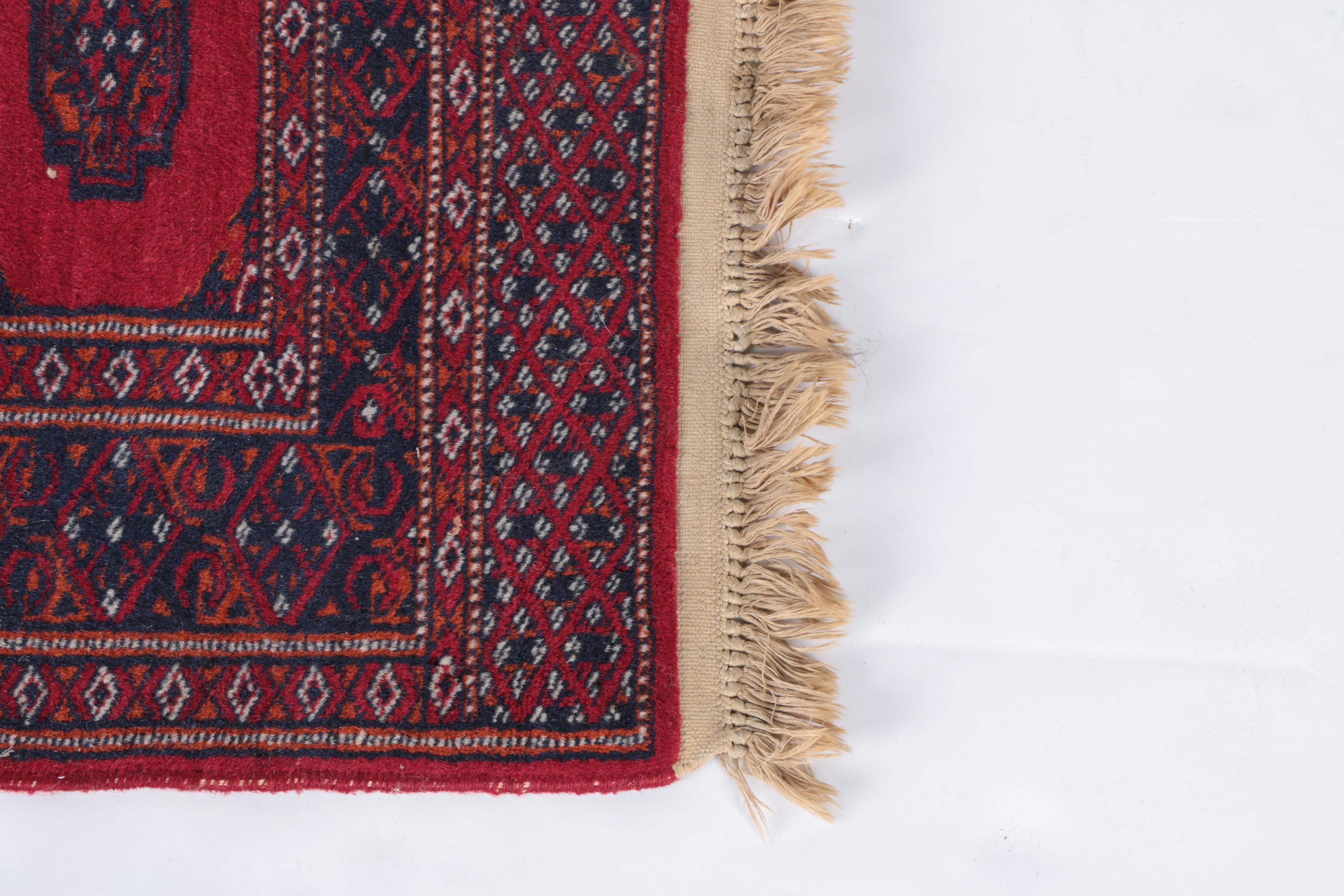 Pair of Hand-Knotted Tekke Bokhara Wool Accent Rugs