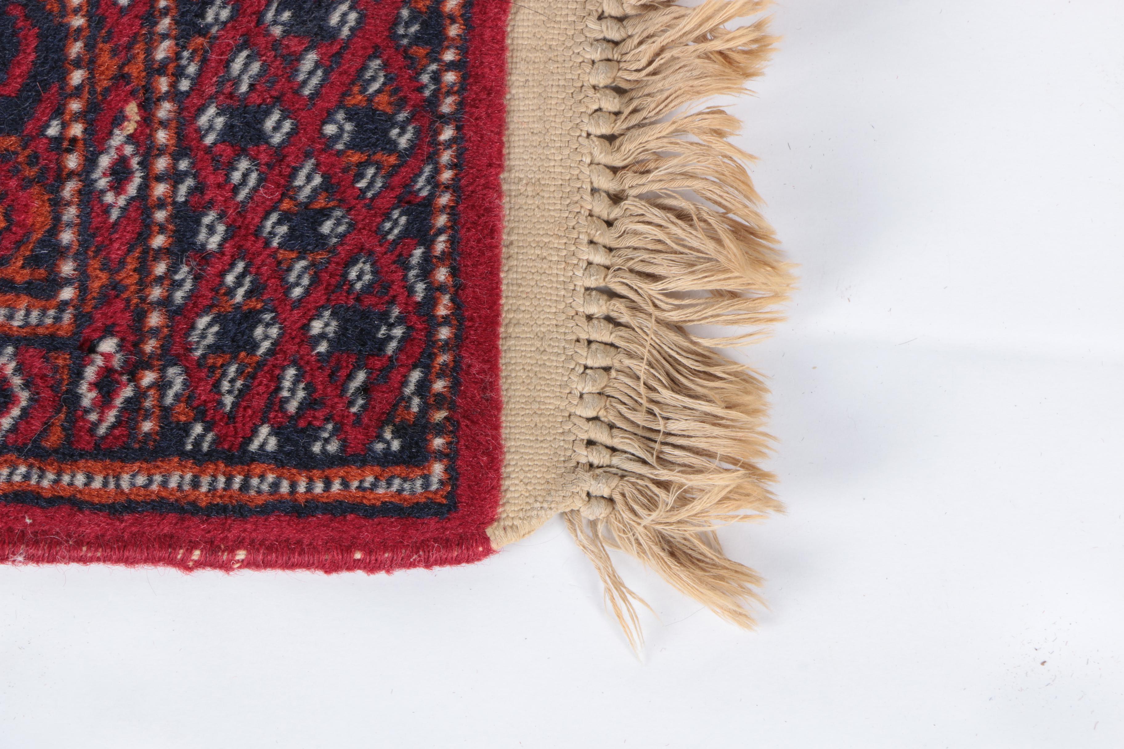 Pair of Hand-Knotted Tekke Bokhara Wool Accent Rugs