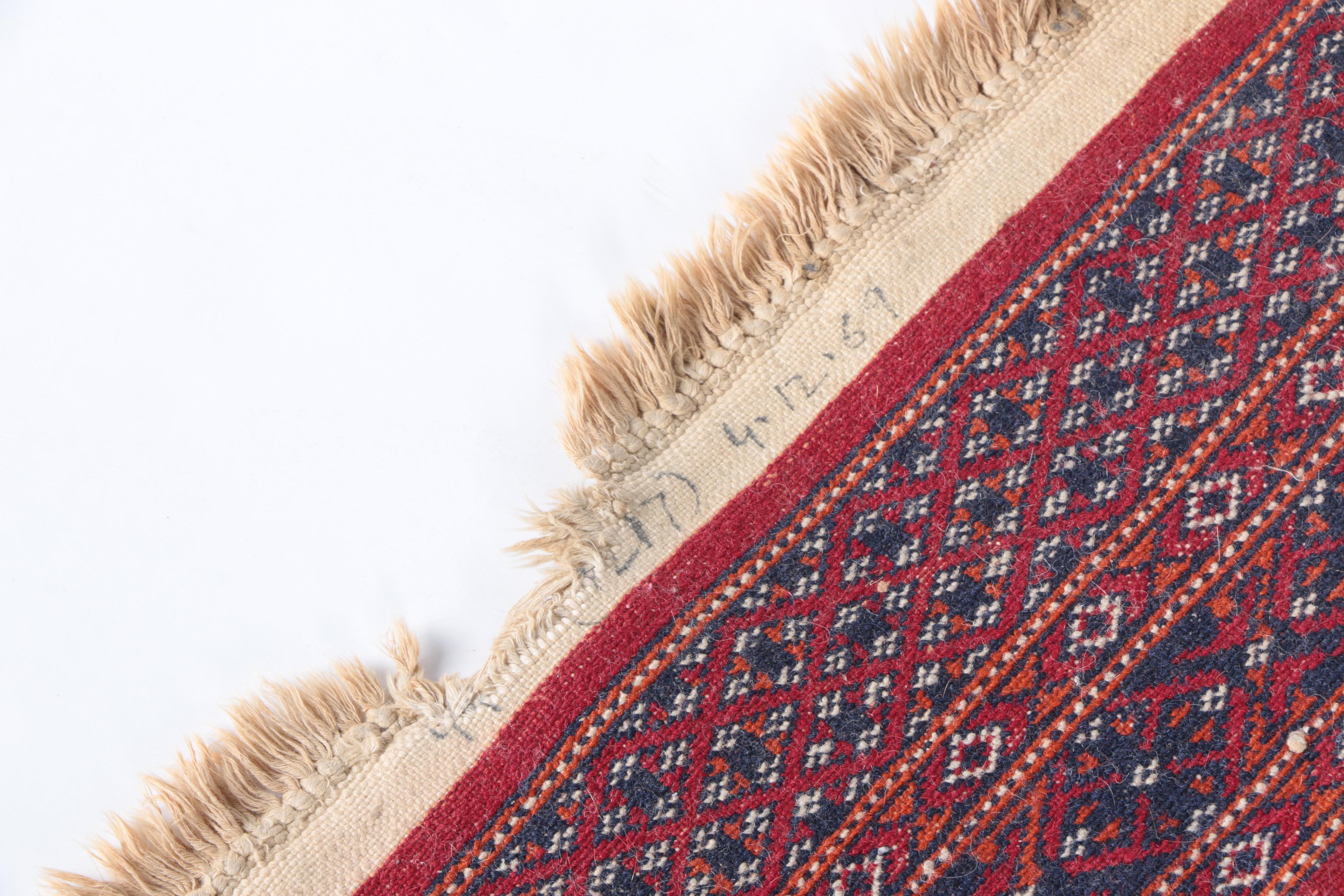 Pair of Hand-Knotted Tekke Bokhara Wool Accent Rugs