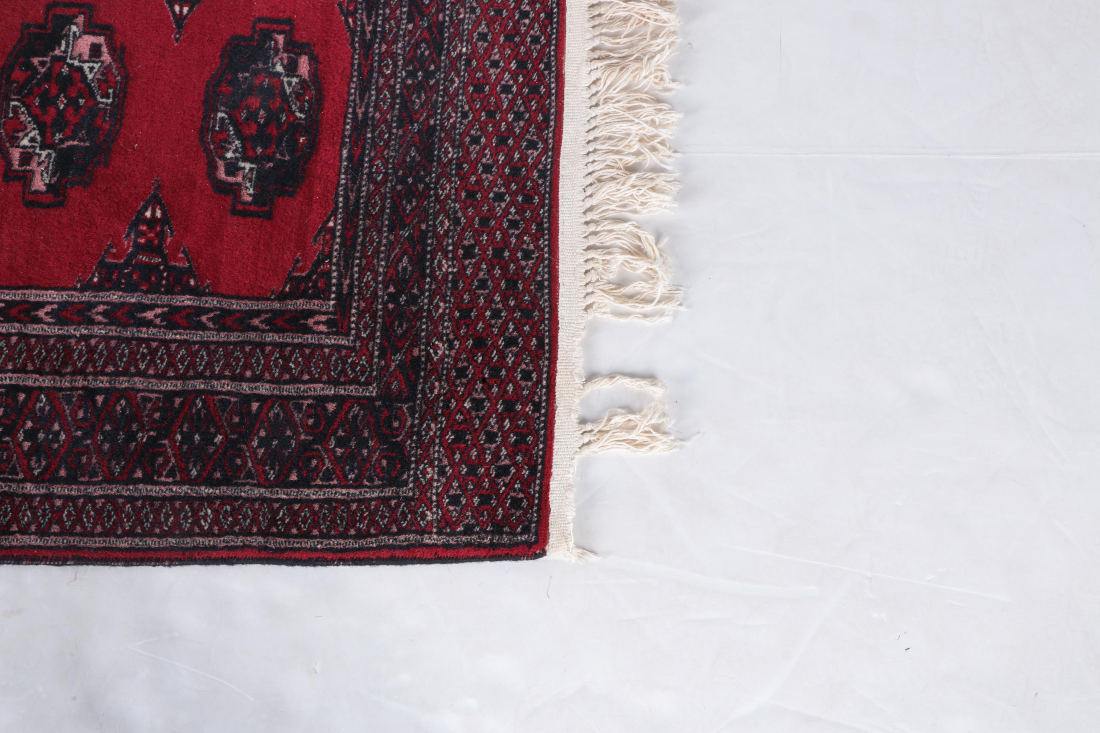 Pair of Hand-Knotted Tekke Bokhara Wool Accent Rugs