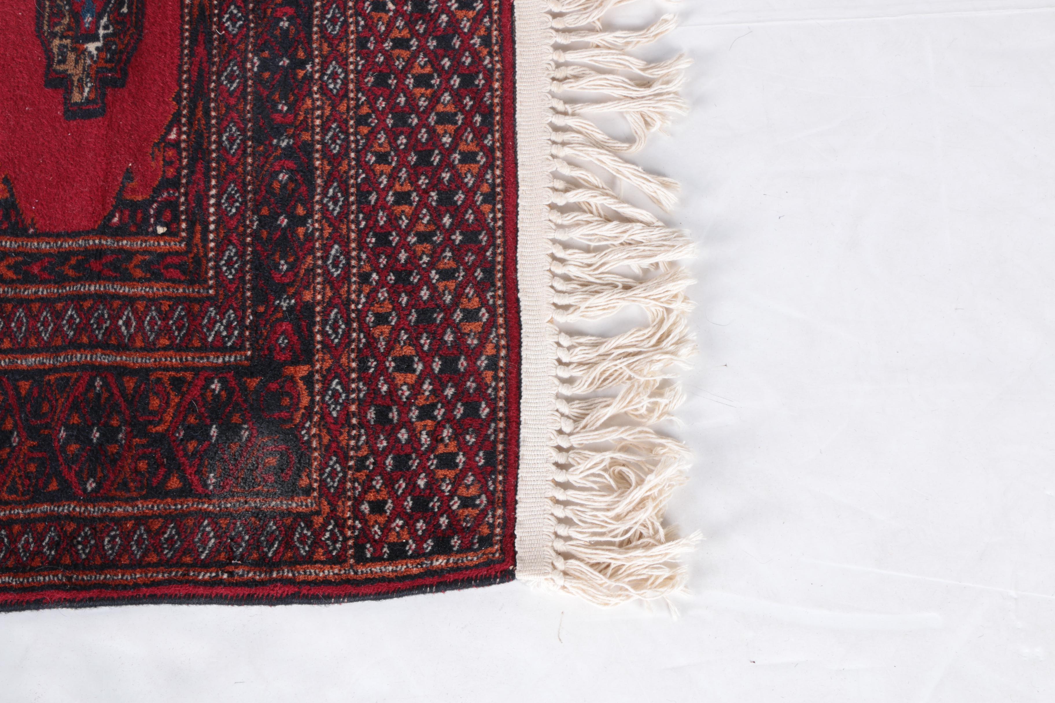 Pair of Hand-Knotted Tekke Bokhara Wool Accent Rugs