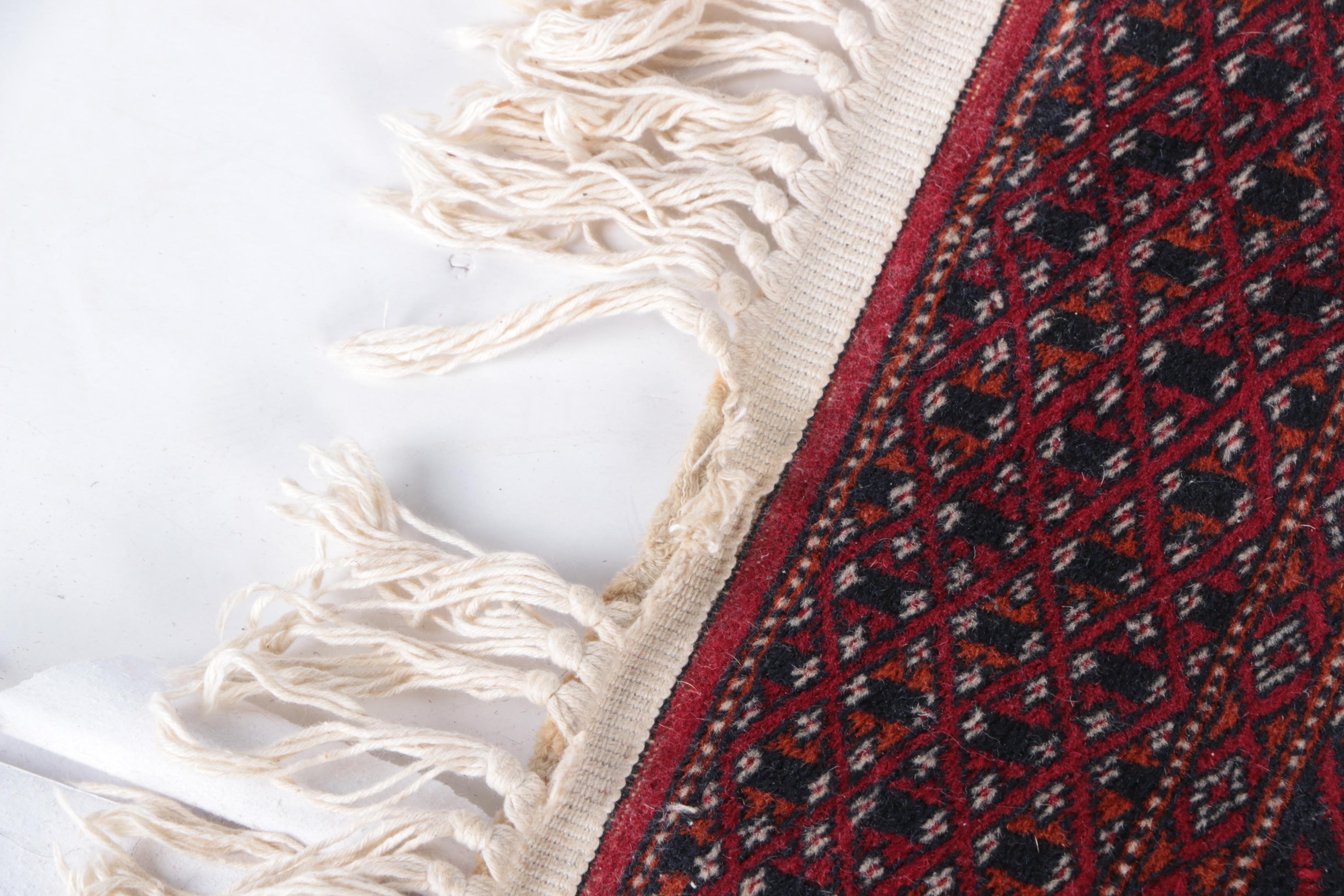 Pair of Hand-Knotted Tekke Bokhara Wool Accent Rugs