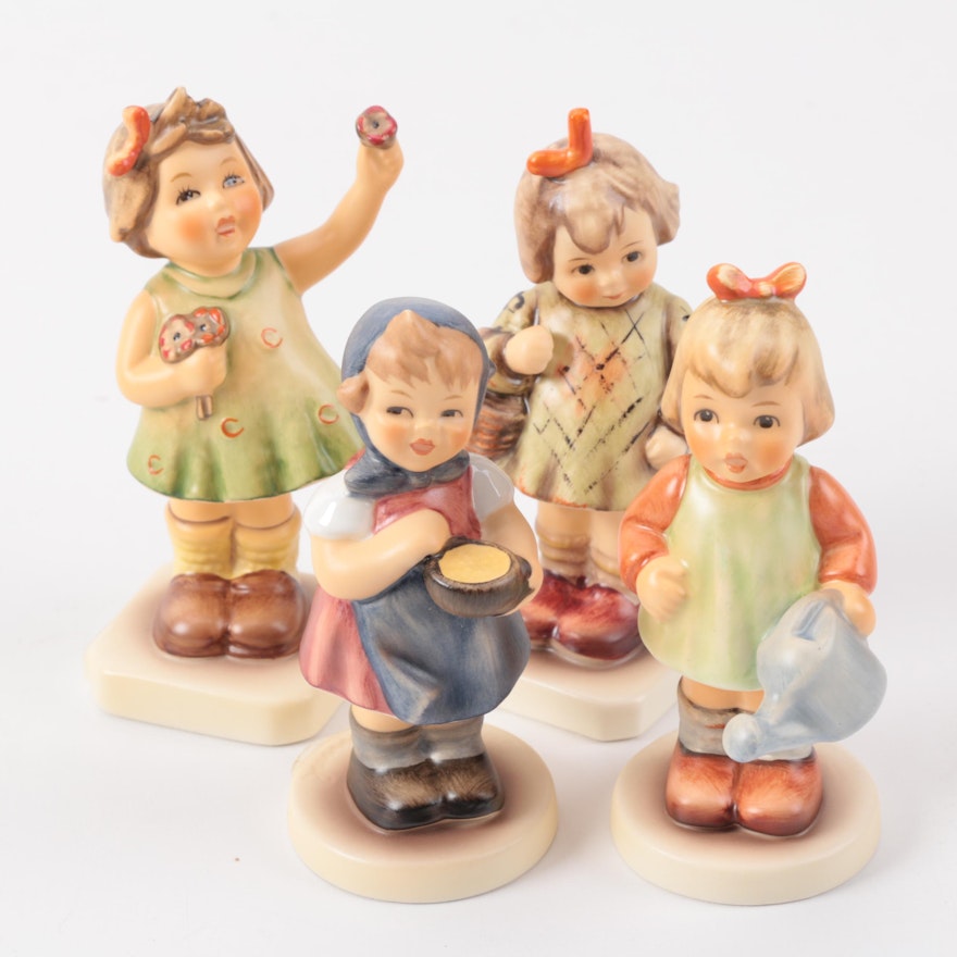 Goebel Hummel Figurines Featuring an M.I. Hummel Collector's Club Figurine