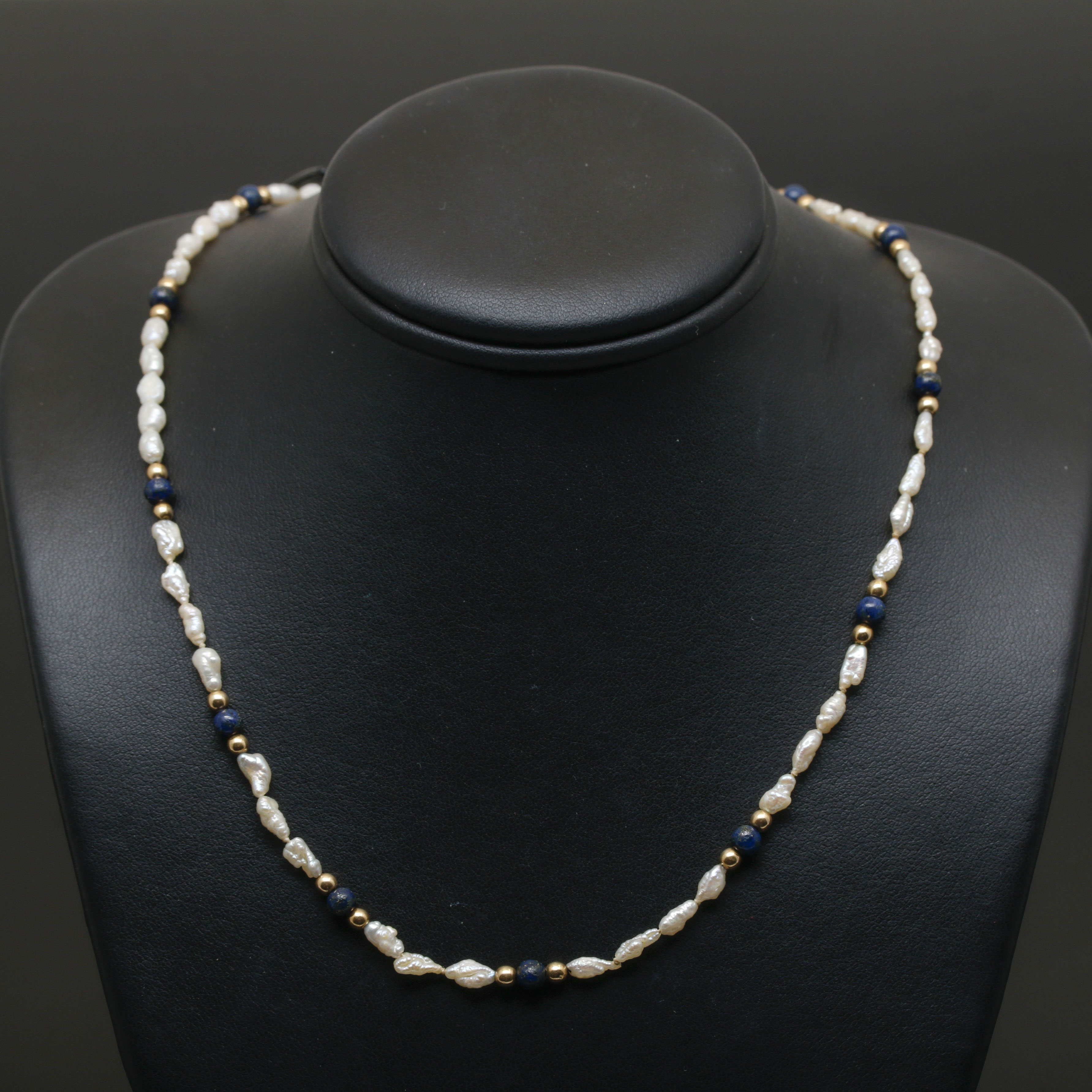 Assortment of 14K Yellow Gold Gemstone Bead Necklace and Bracelets.