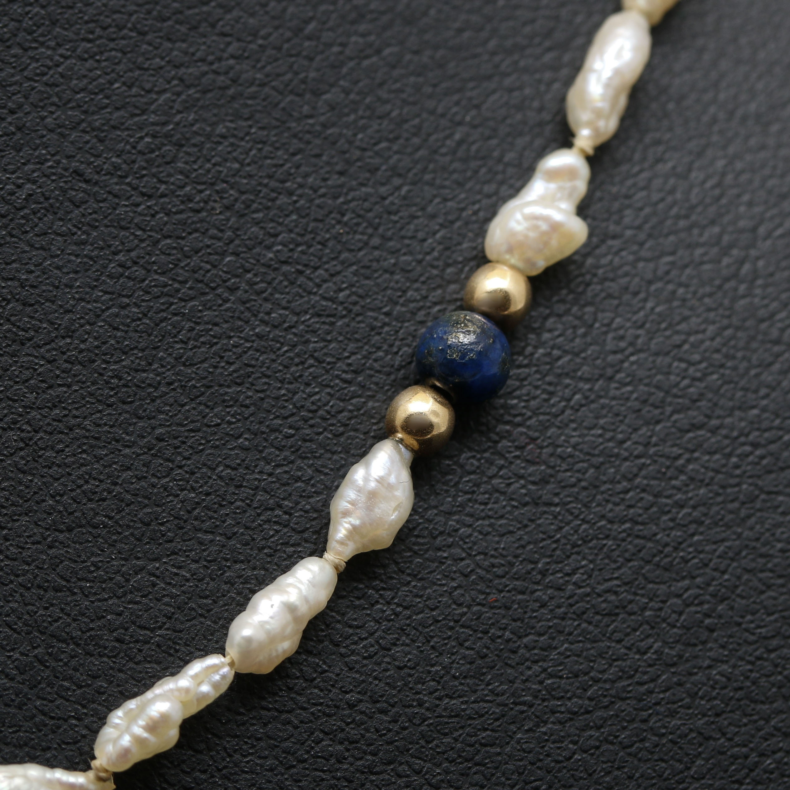Assortment of 14K Yellow Gold Gemstone Bead Necklace and Bracelets.