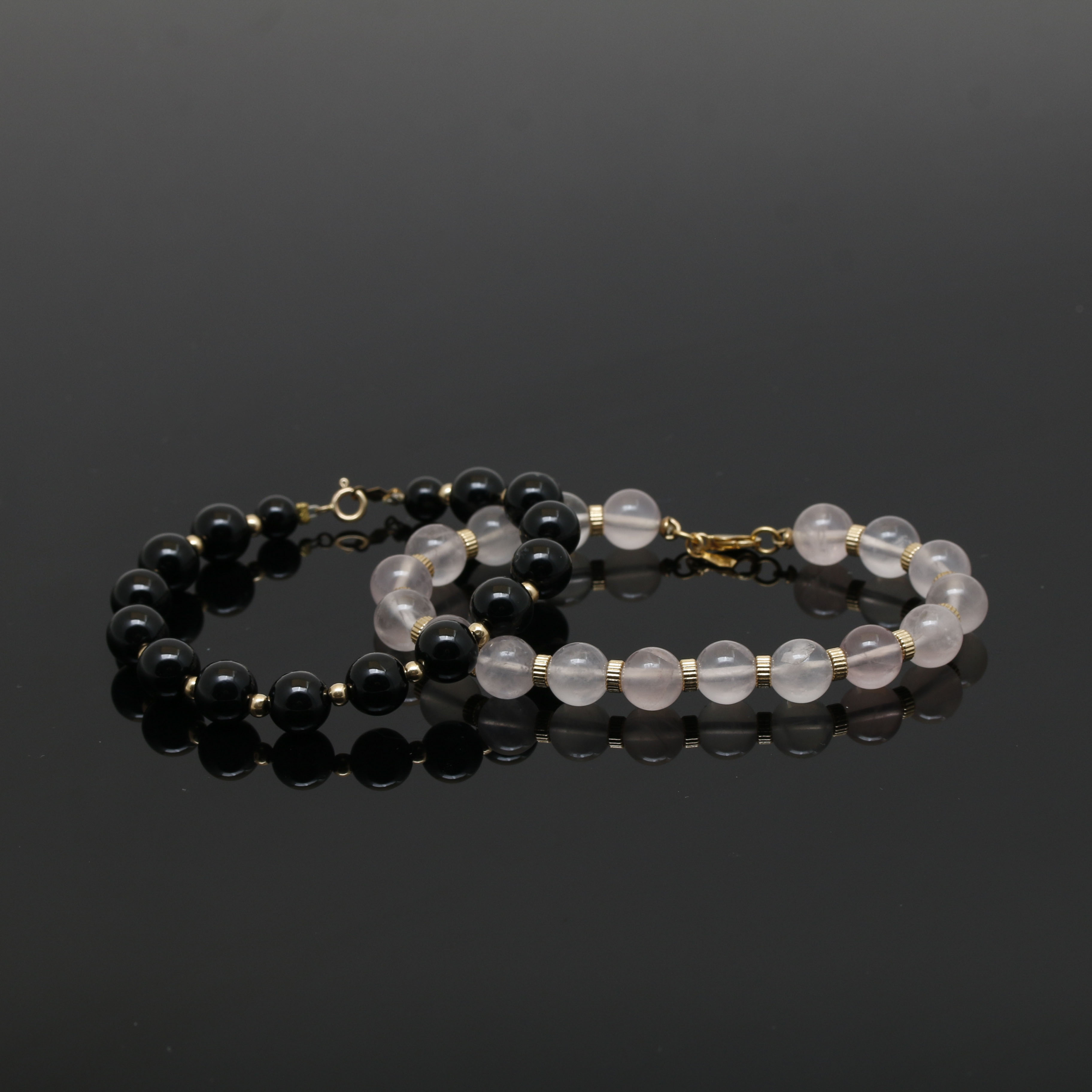 Assortment of 14K Yellow Gold Gemstone Bead Necklace and Bracelets.