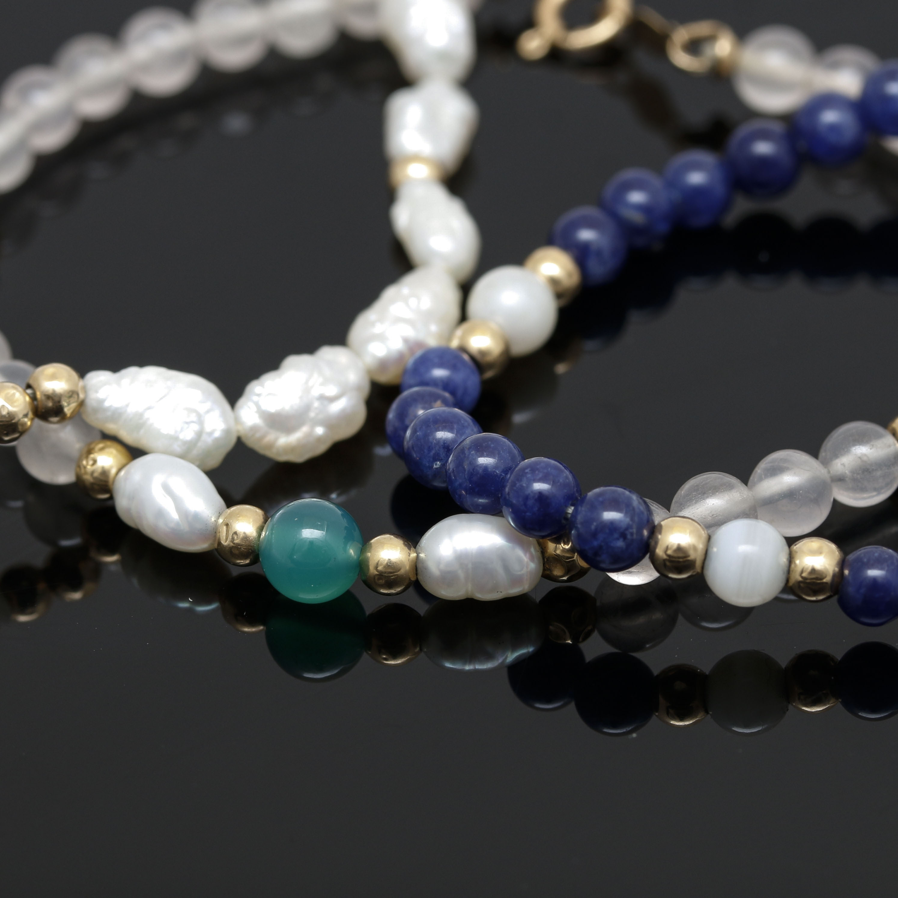 Assortment of 14K Yellow Gold Gemstone Bead Necklace and Bracelets.