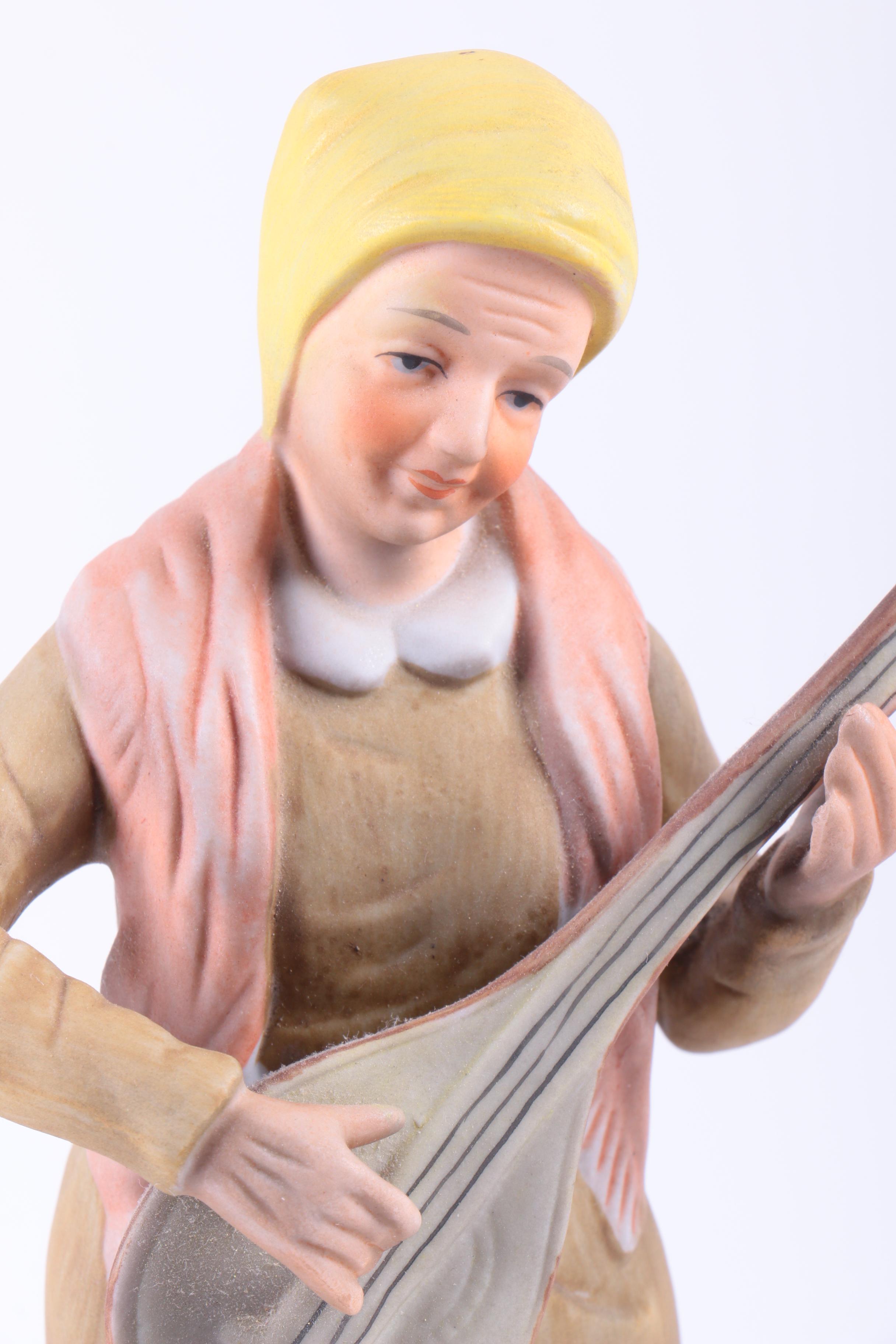 Vintage UCGC Japan "Old Woman Playing Mandolin" Bisque Porcelain Figurine