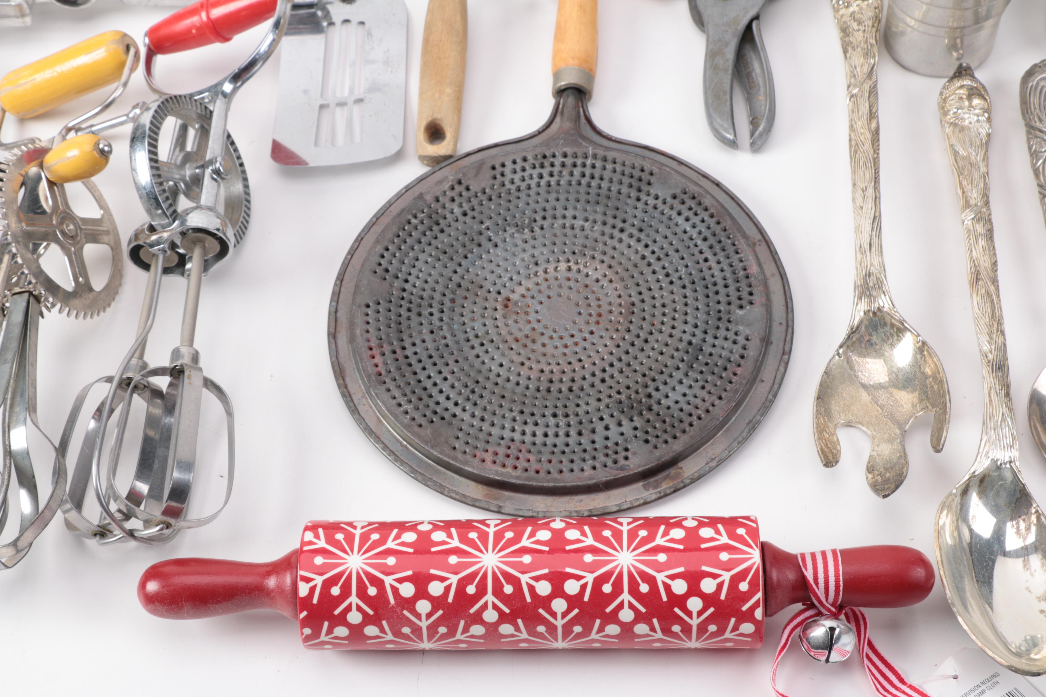 Vintage Kitchen Gadgets Featuring Hand Mixers, Serving Utensils and More