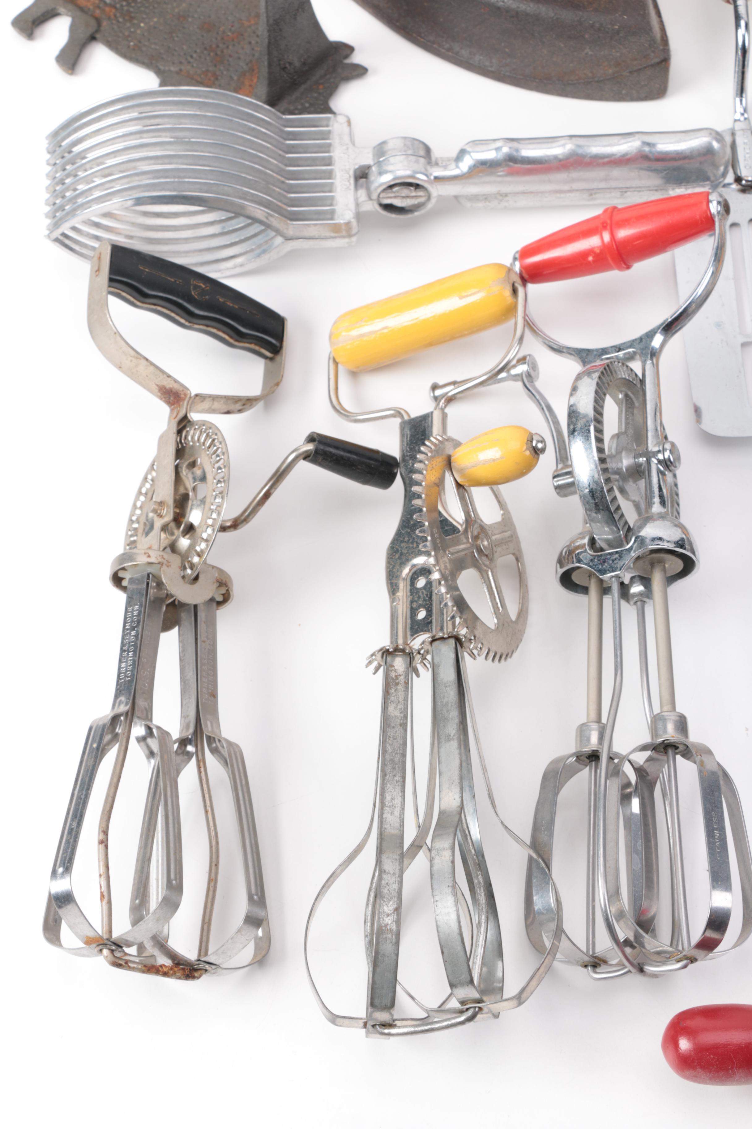 Vintage Kitchen Gadgets Featuring Hand Mixers, Serving Utensils and More