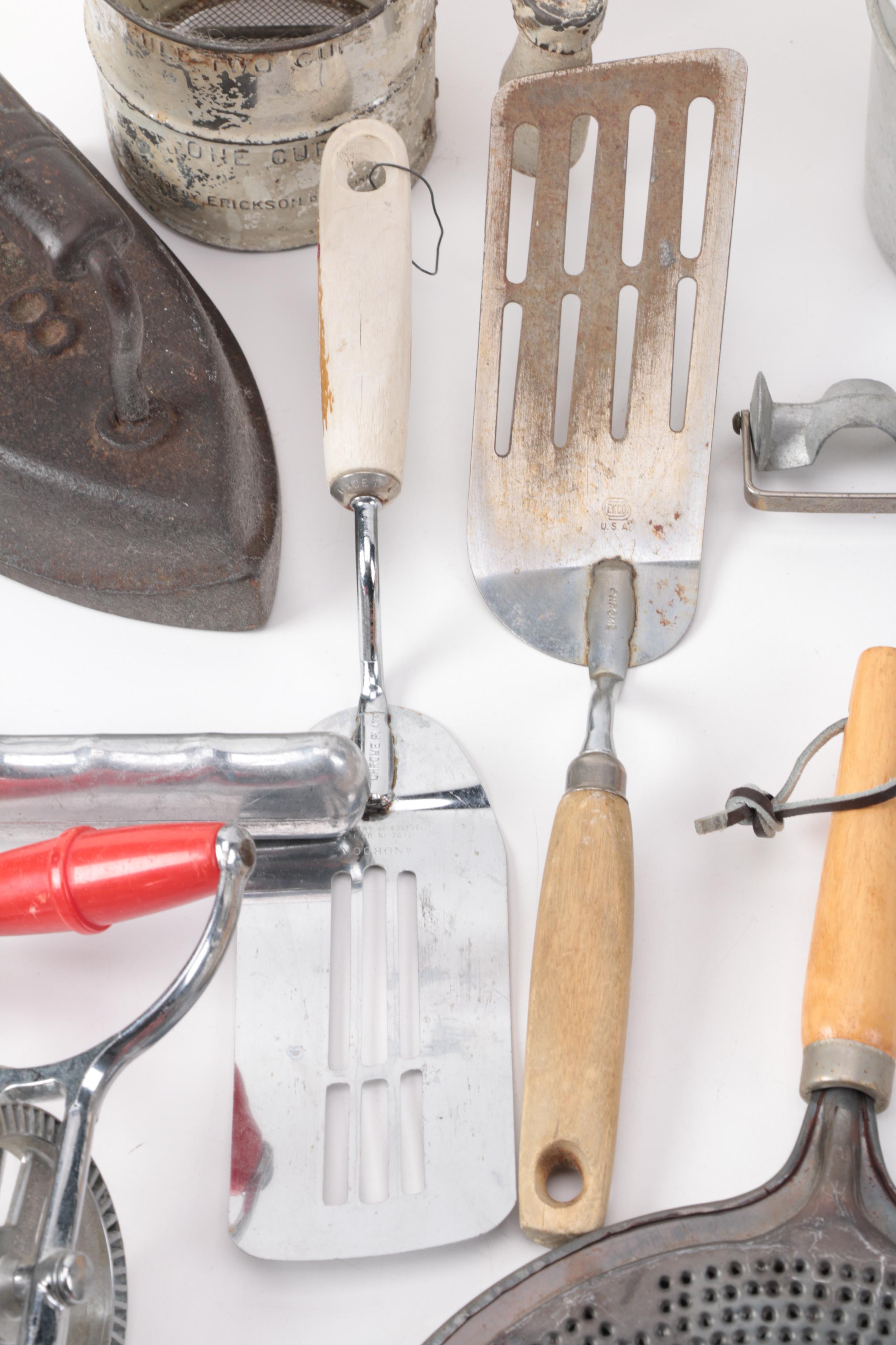 Vintage Kitchen Gadgets Featuring Hand Mixers, Serving Utensils and More