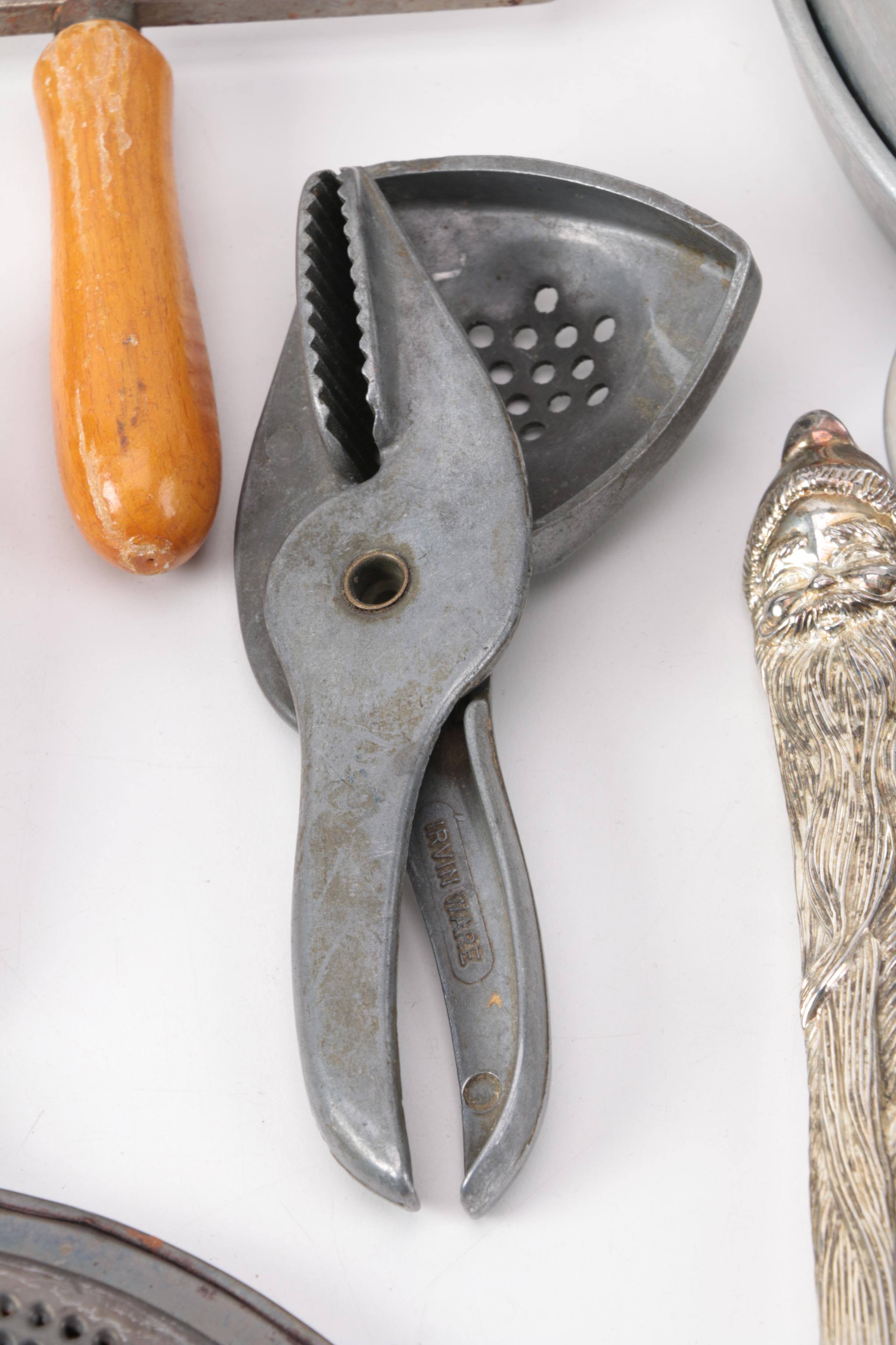 Vintage Kitchen Gadgets Featuring Hand Mixers, Serving Utensils and More