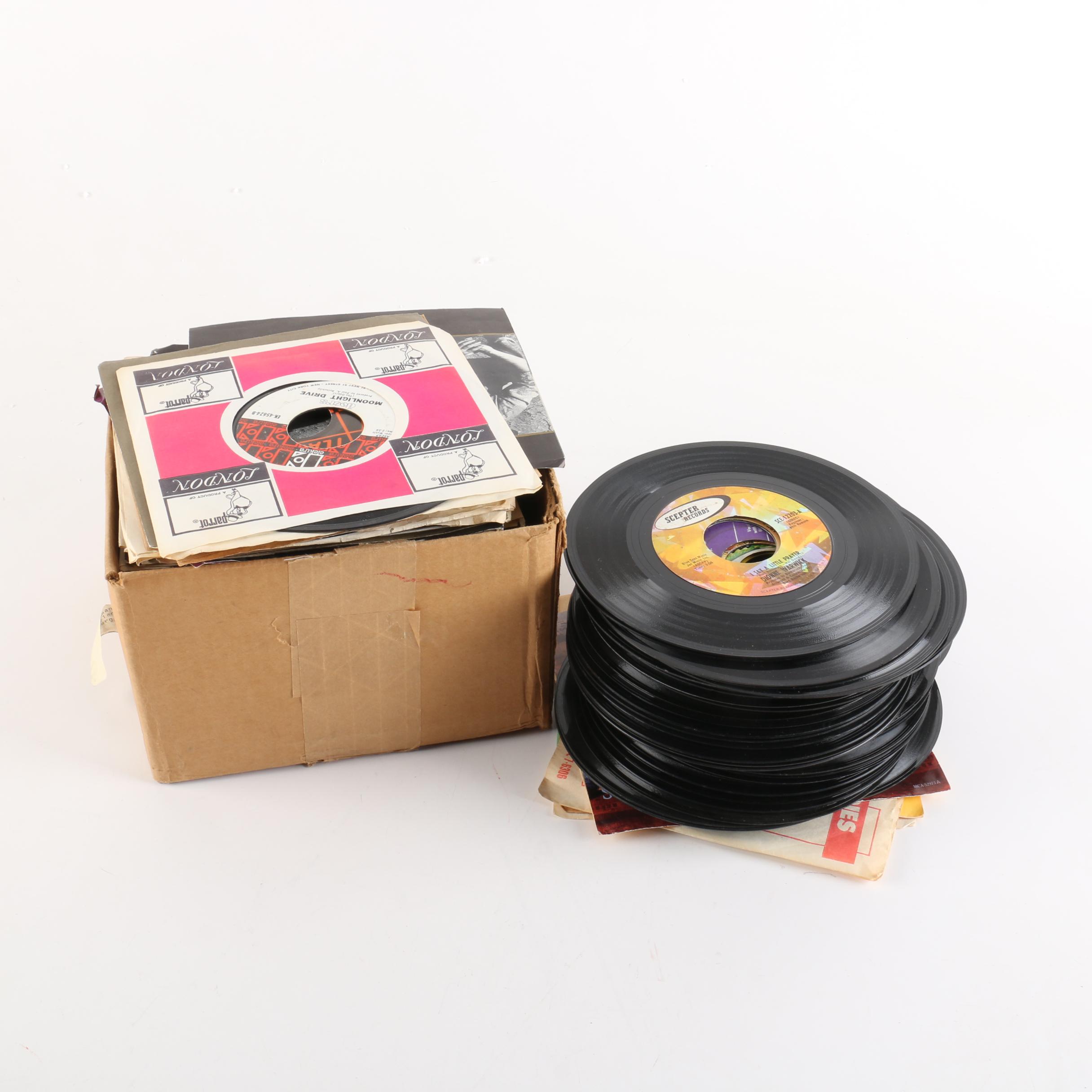 Vintage 45 RPM Records Including Dionne Warwick, Duran Duran, and Diana Ross