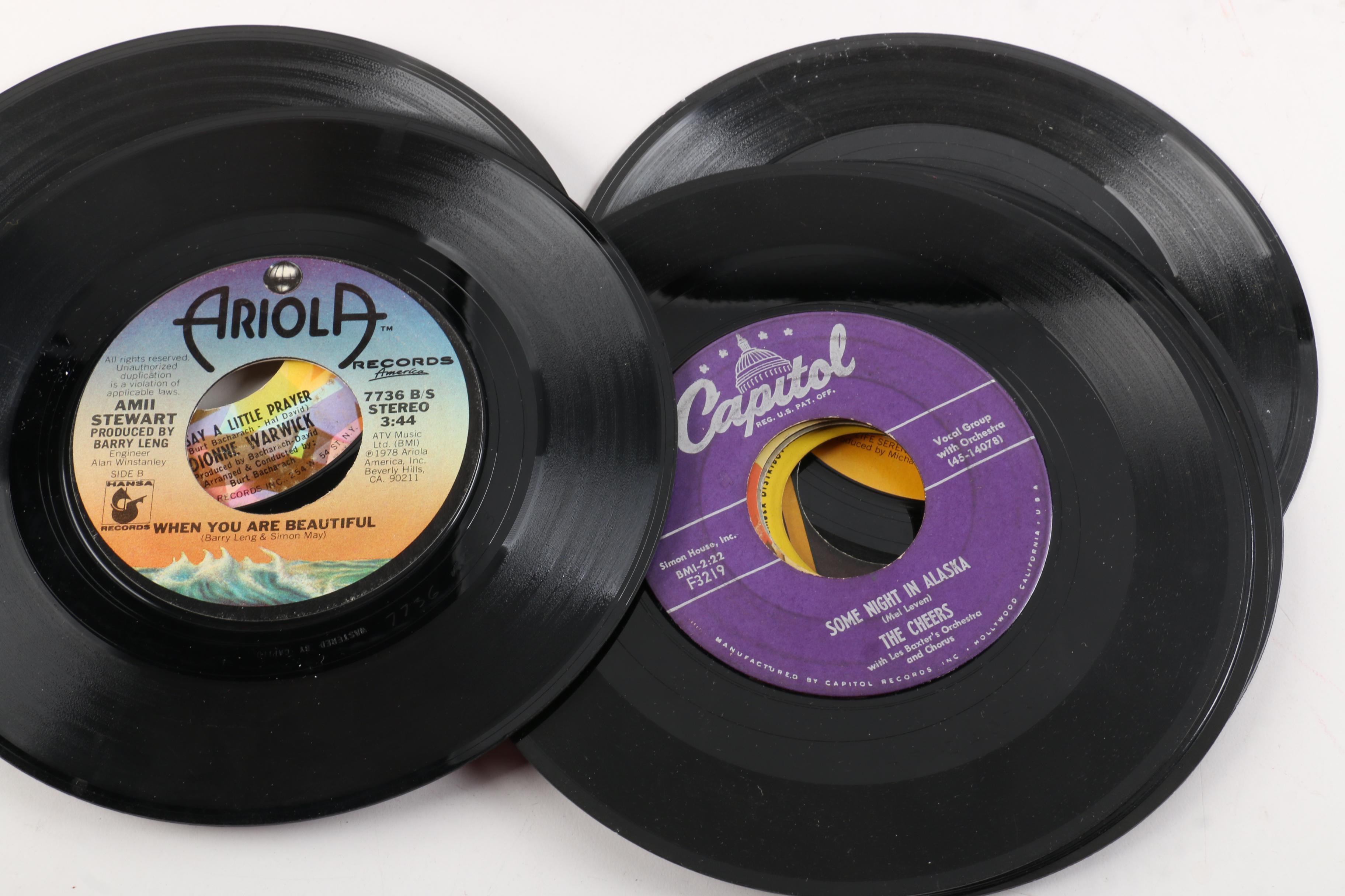 Vintage 45 RPM Records Including Dionne Warwick, Duran Duran, and Diana Ross