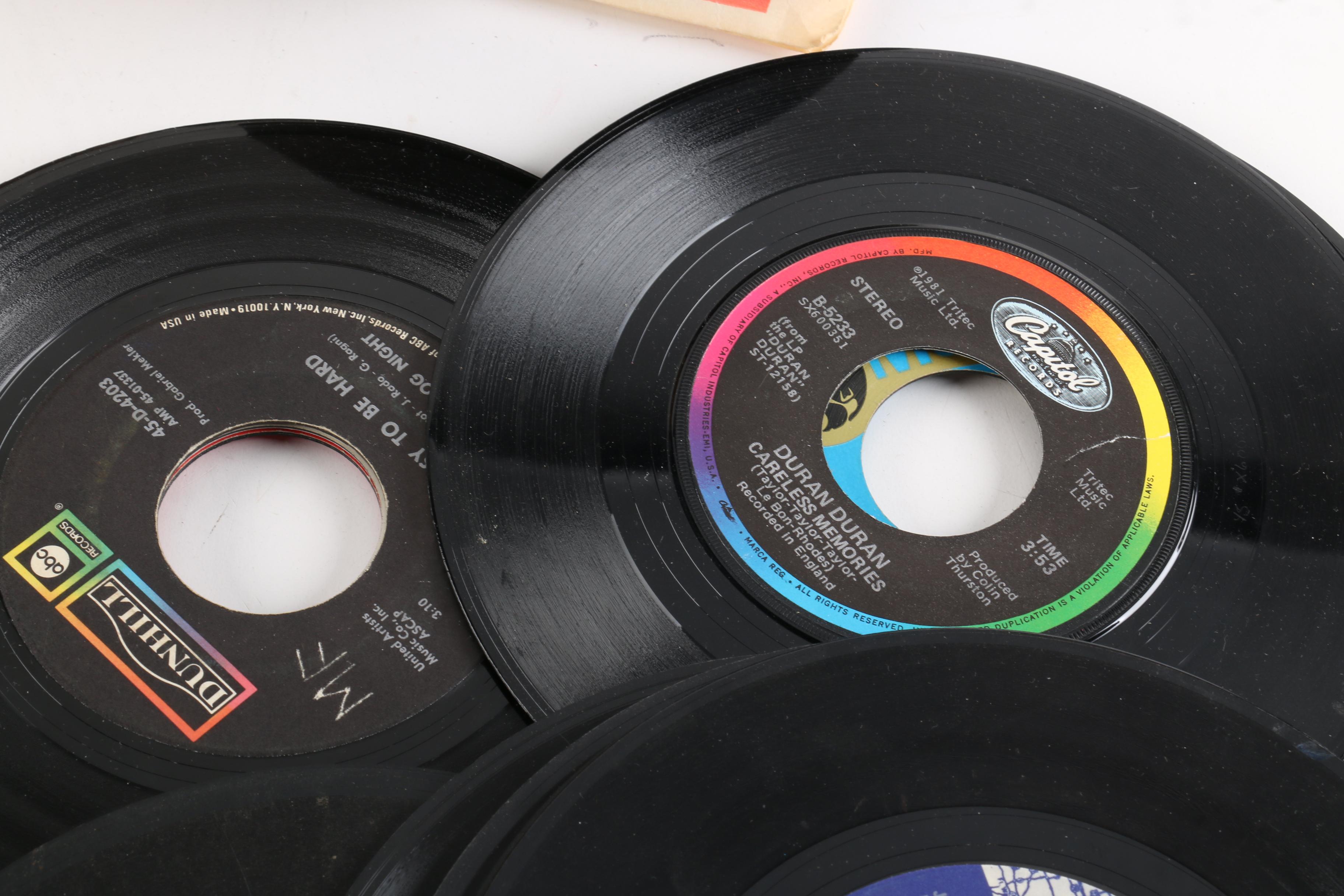 Vintage 45 RPM Records Including Dionne Warwick, Duran Duran, and Diana Ross