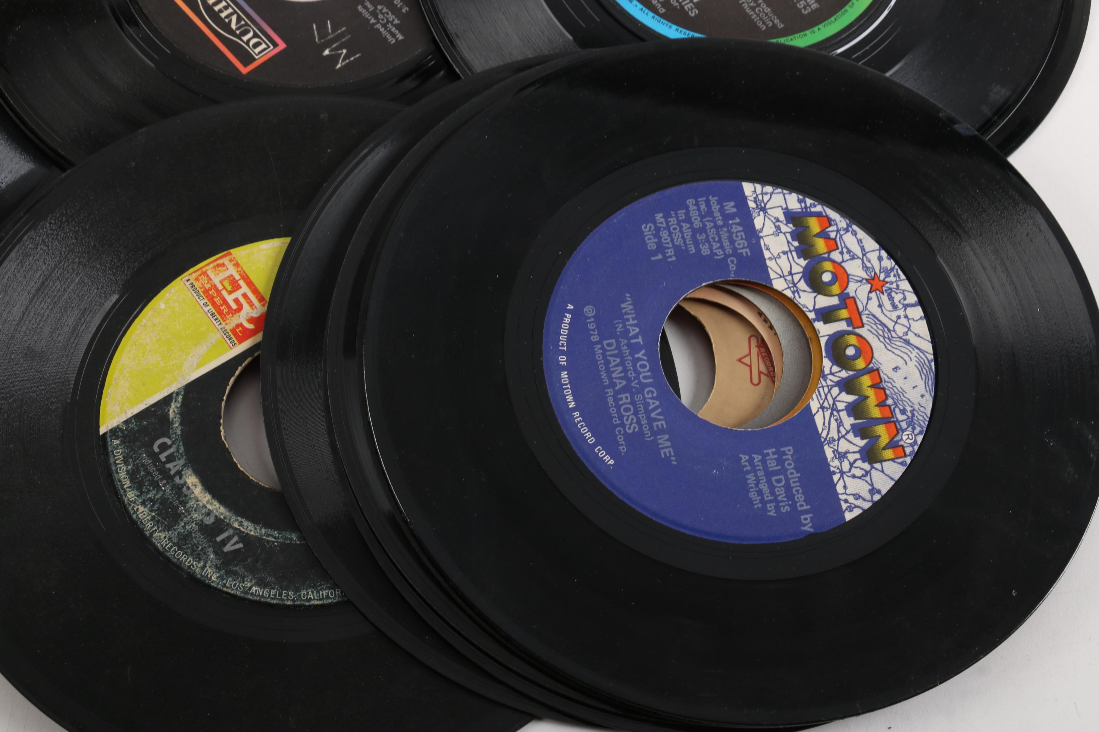 Vintage 45 RPM Records Including Dionne Warwick, Duran Duran, and Diana Ross